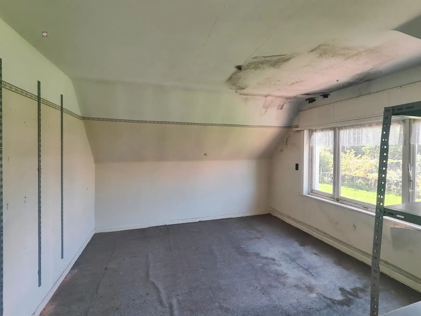 Karaktervolle te renoveren woning met 3 slaapkamers en tuin in Denderleeuw foto 11