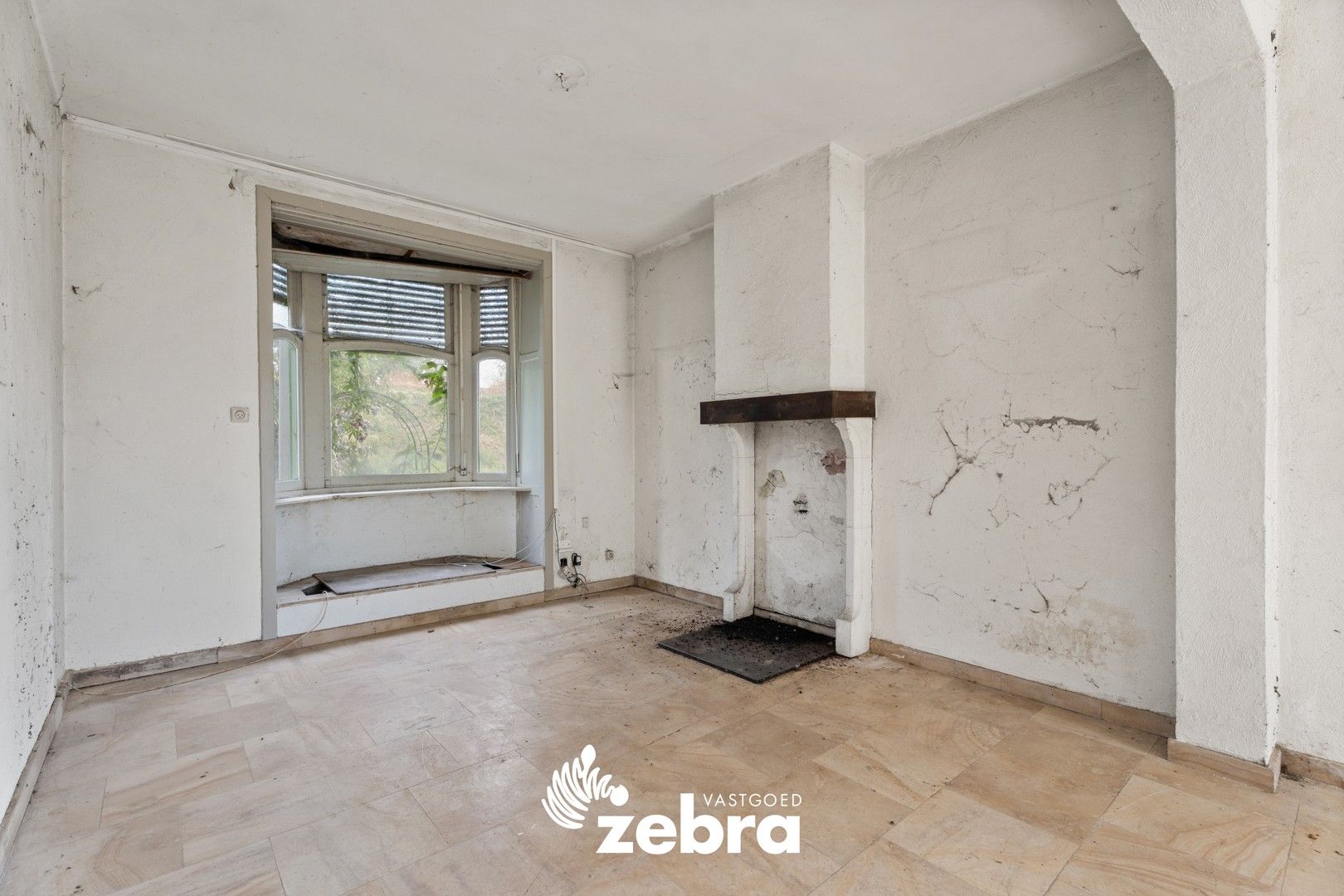 Te renoveren woning met 5 slaapkamers en veel potentieel in Sint-Michiels! foto 4