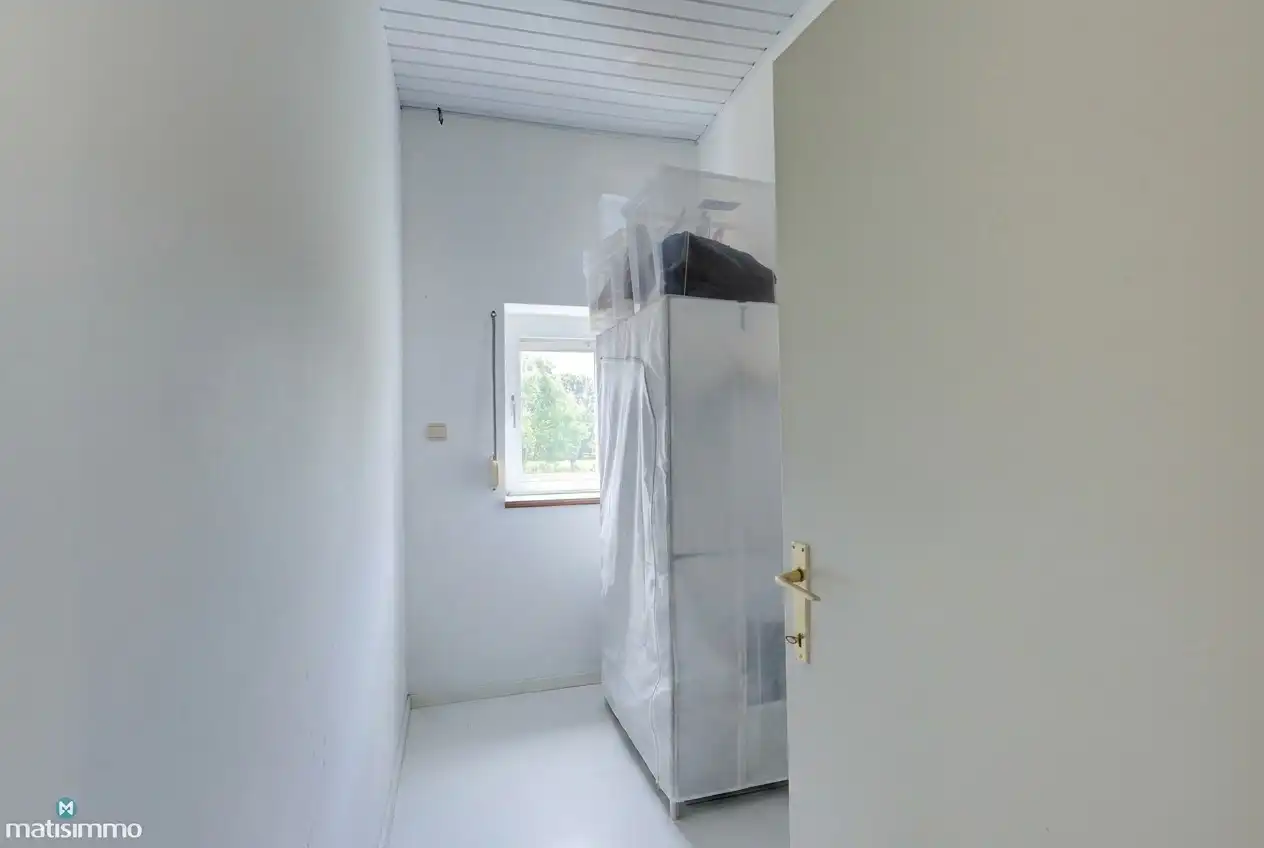 RUIME GEZINSWONING MET 2 SLAAPKAMERS EN VEEL BERGRUIMTE NABIJ HET CENTRUM TE BILZEN foto 19