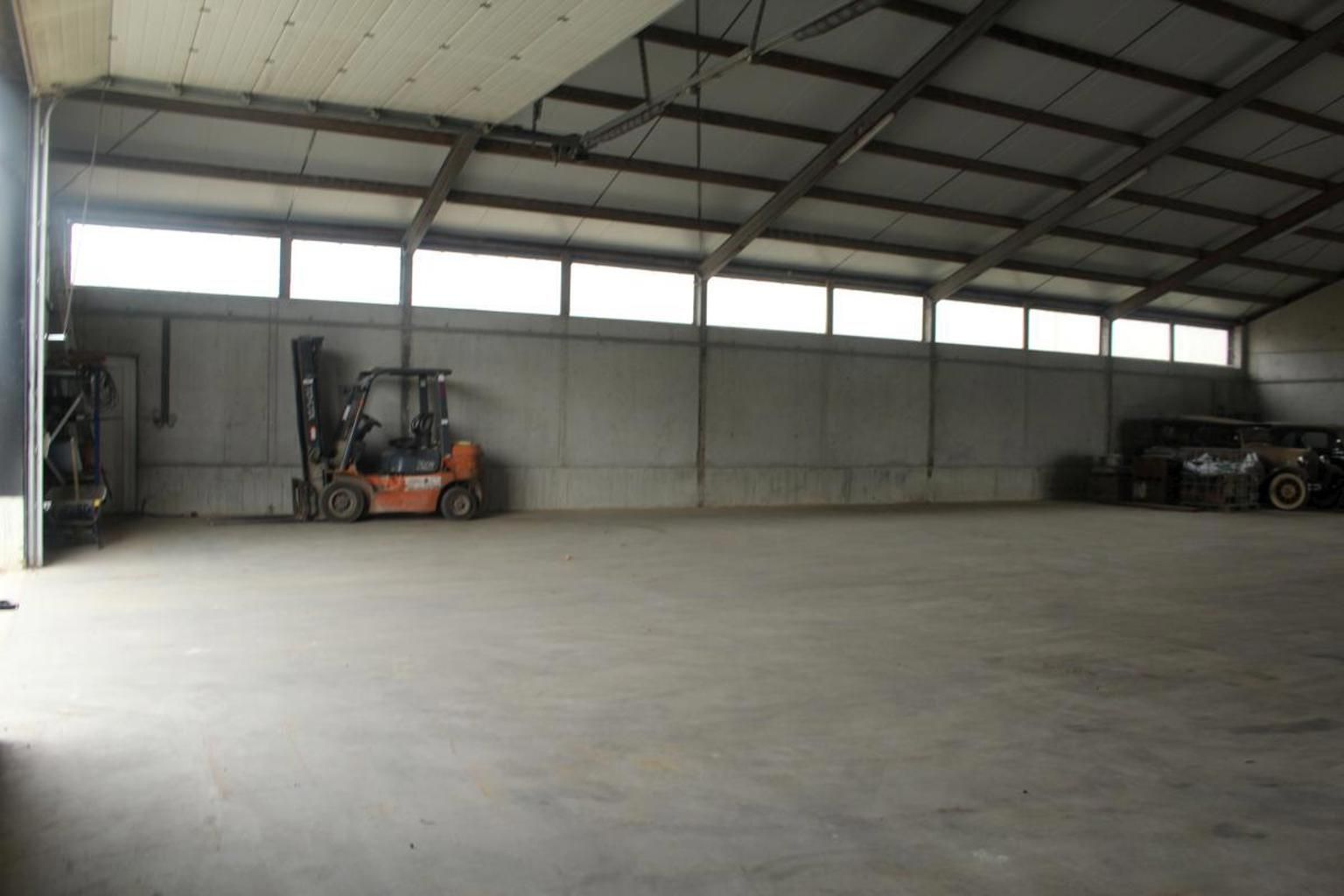 Opslagloods met buitenplein foto 6