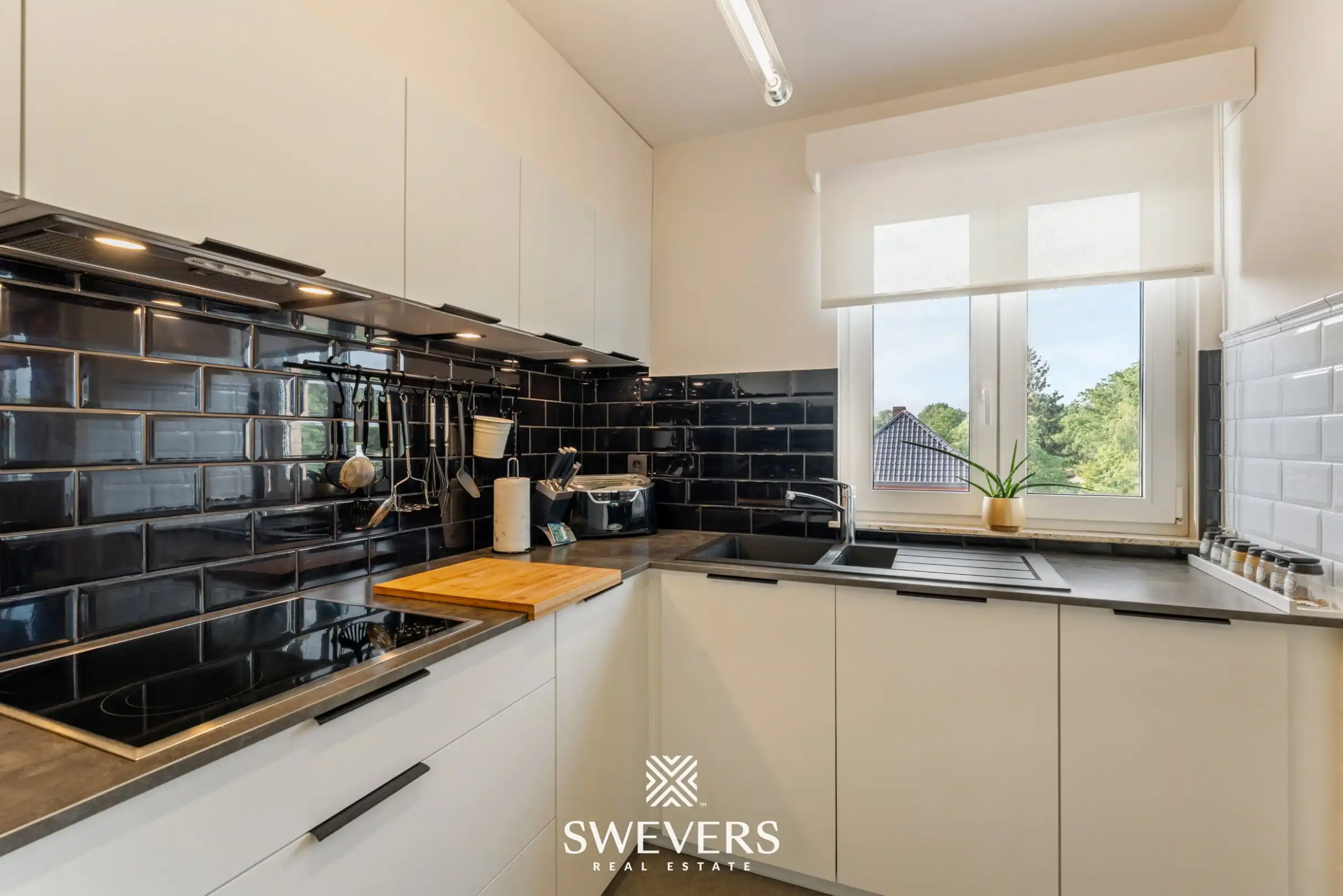 Gerenoveerd appartement met garagebox en kelderberging foto 8