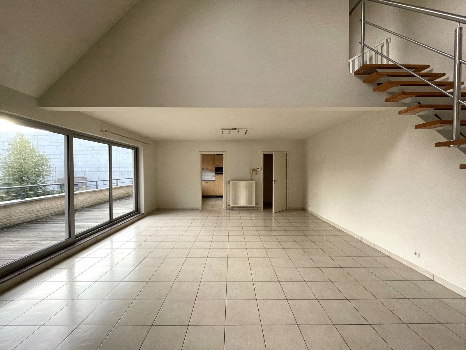 Duplex appartement met vide en groot zonnig terras foto {{pictureIndex}}