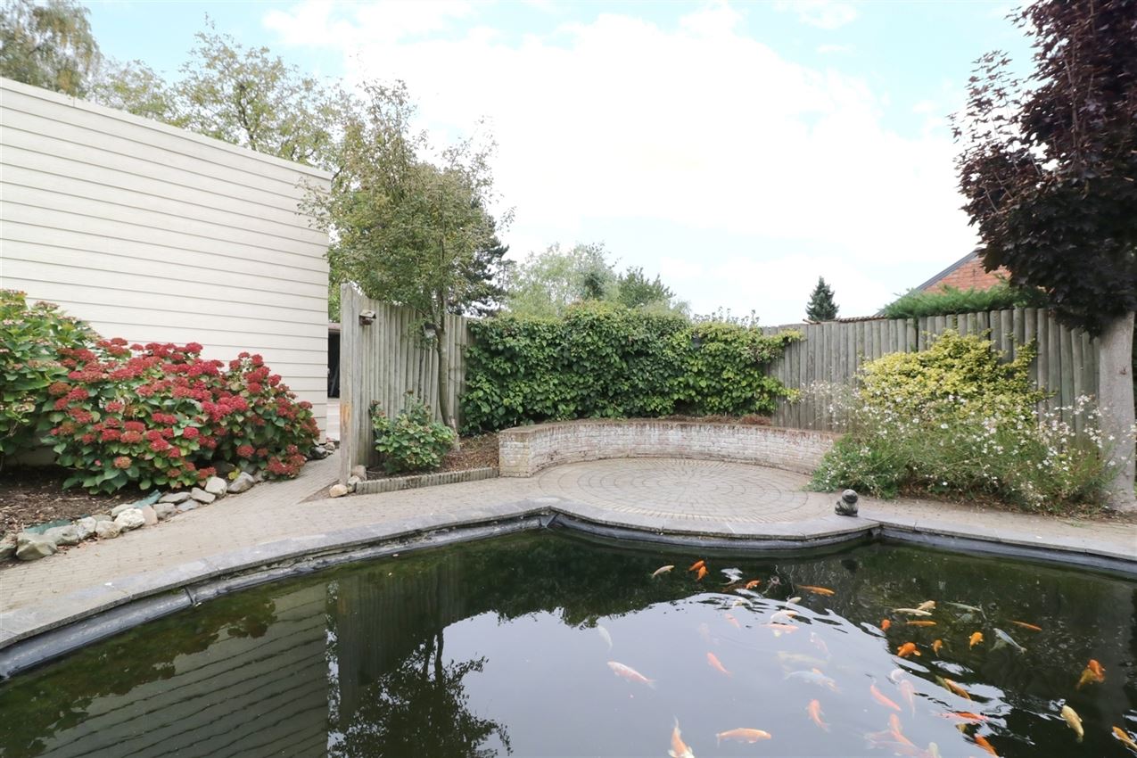 label c, nabij station, garage voor vijf wagens foto 5