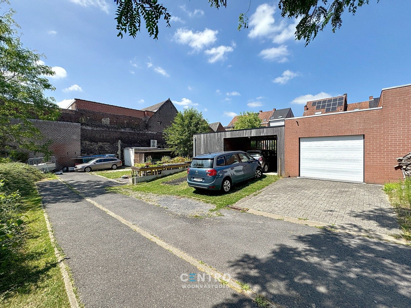 Ruime woning met 3 slpks met grote tuin en UITWEG ACHTERAAN! foto 26