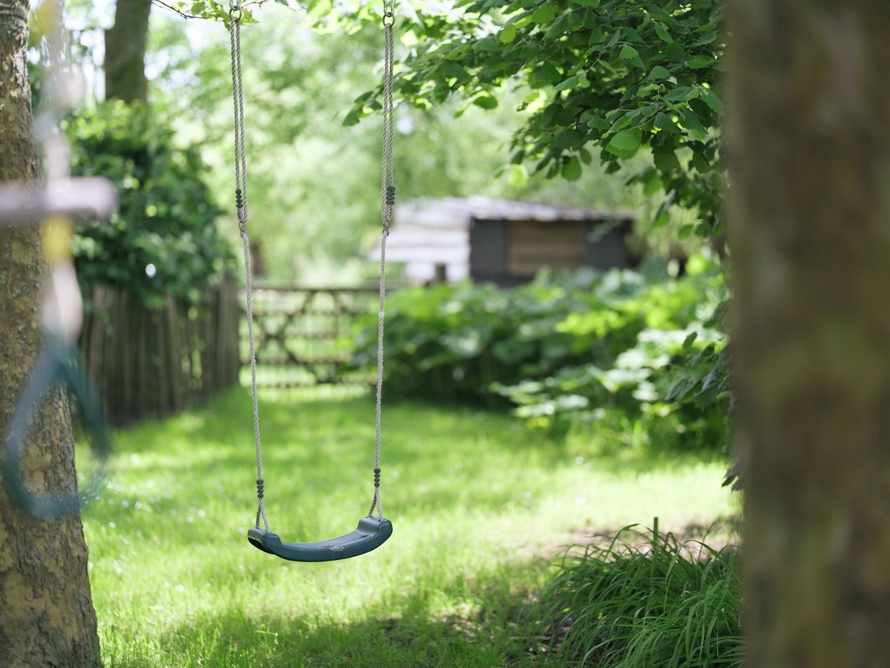 Mooie gezinsvilla met zonnige tuin en weide foto 23