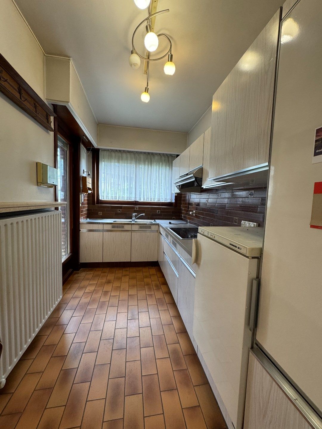 Bel-etagewoning met potentieel en stadstuin in hartje Vilvoorde foto 8