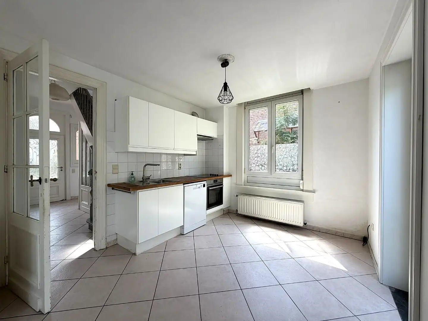 Charmante halfopen woning met Westtuin in een gegeerde woonwijk aan de Basiliek van Edegem! foto 7