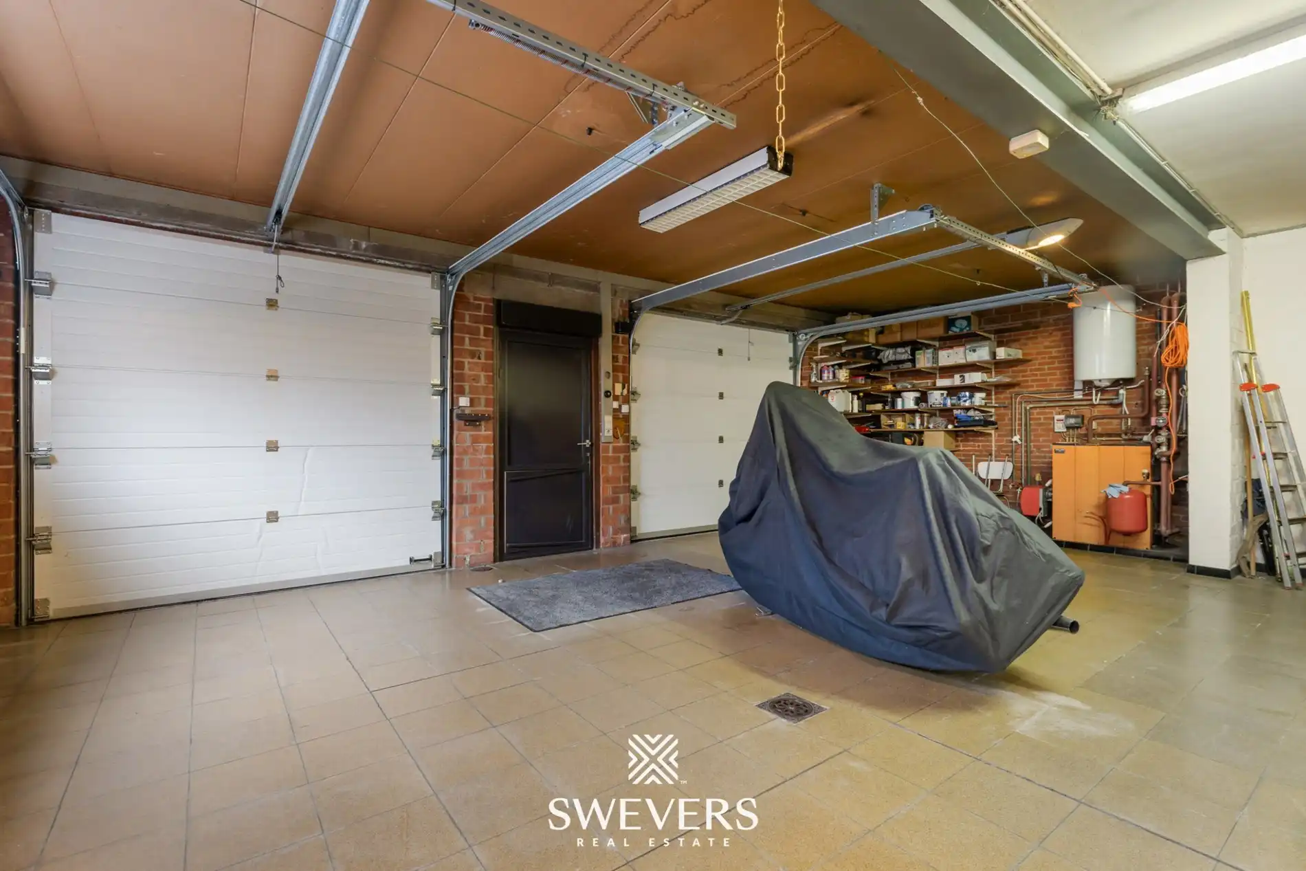 Opbrengsteigendom met handelspand, ruim appartement en uitbreidingspotentieel in hartje Heusden-Zolder foto 47