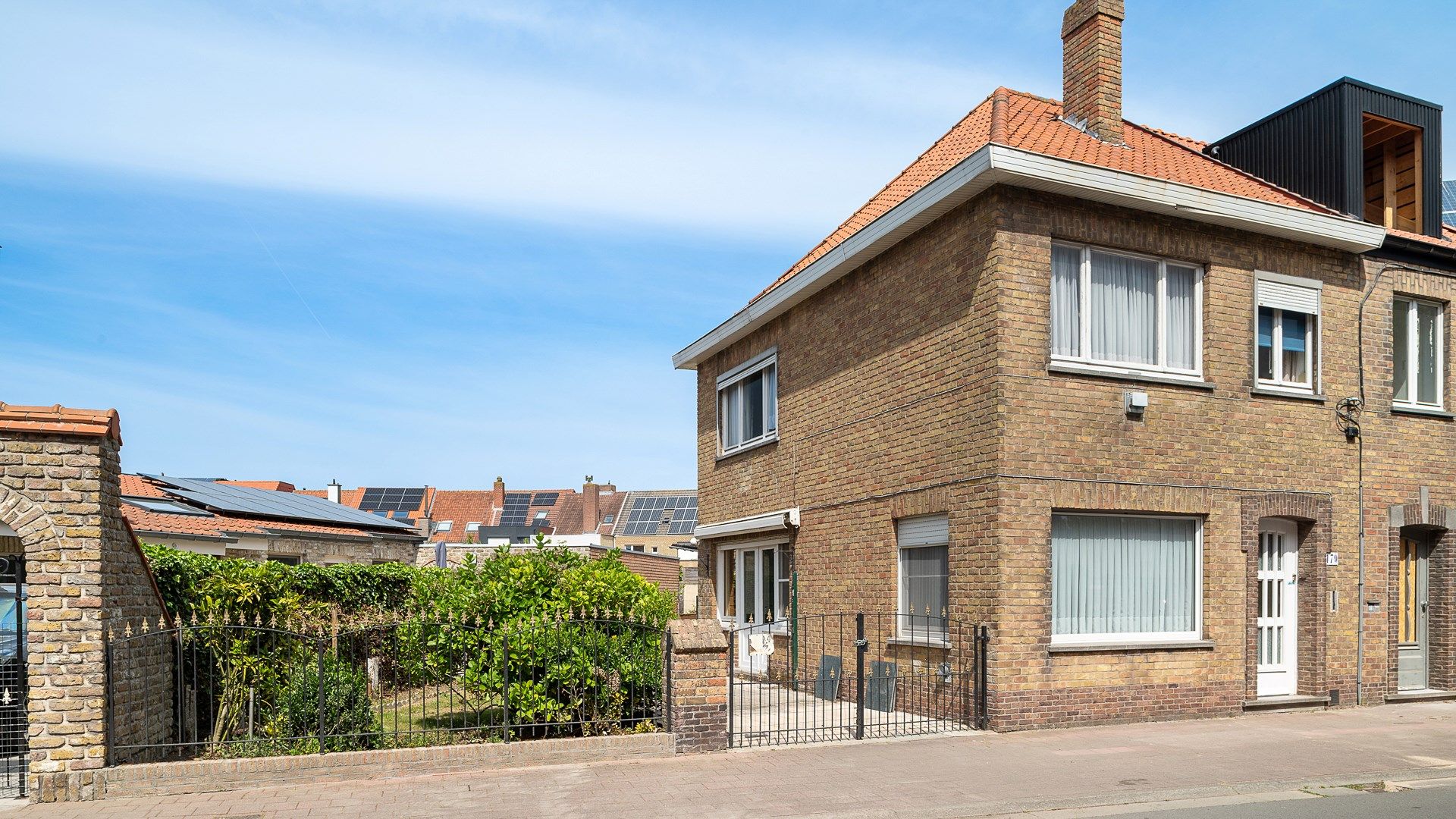 Hoofdfoto van de publicatie: Halfopen woning met parkeergelegenheid te Heist-aan-Zee