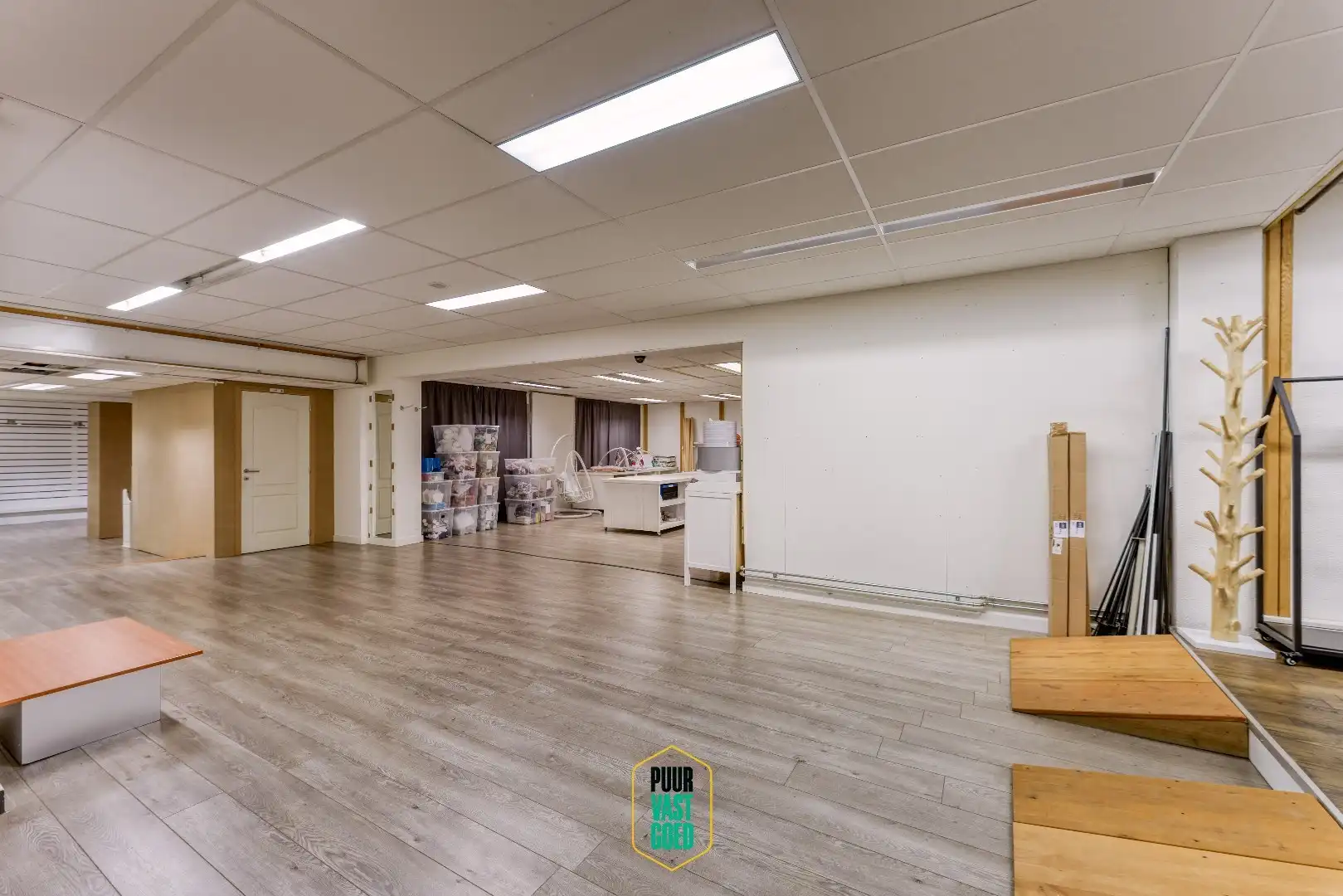 Handelsruimte met achteruitgang en 2 appartementen! foto 6