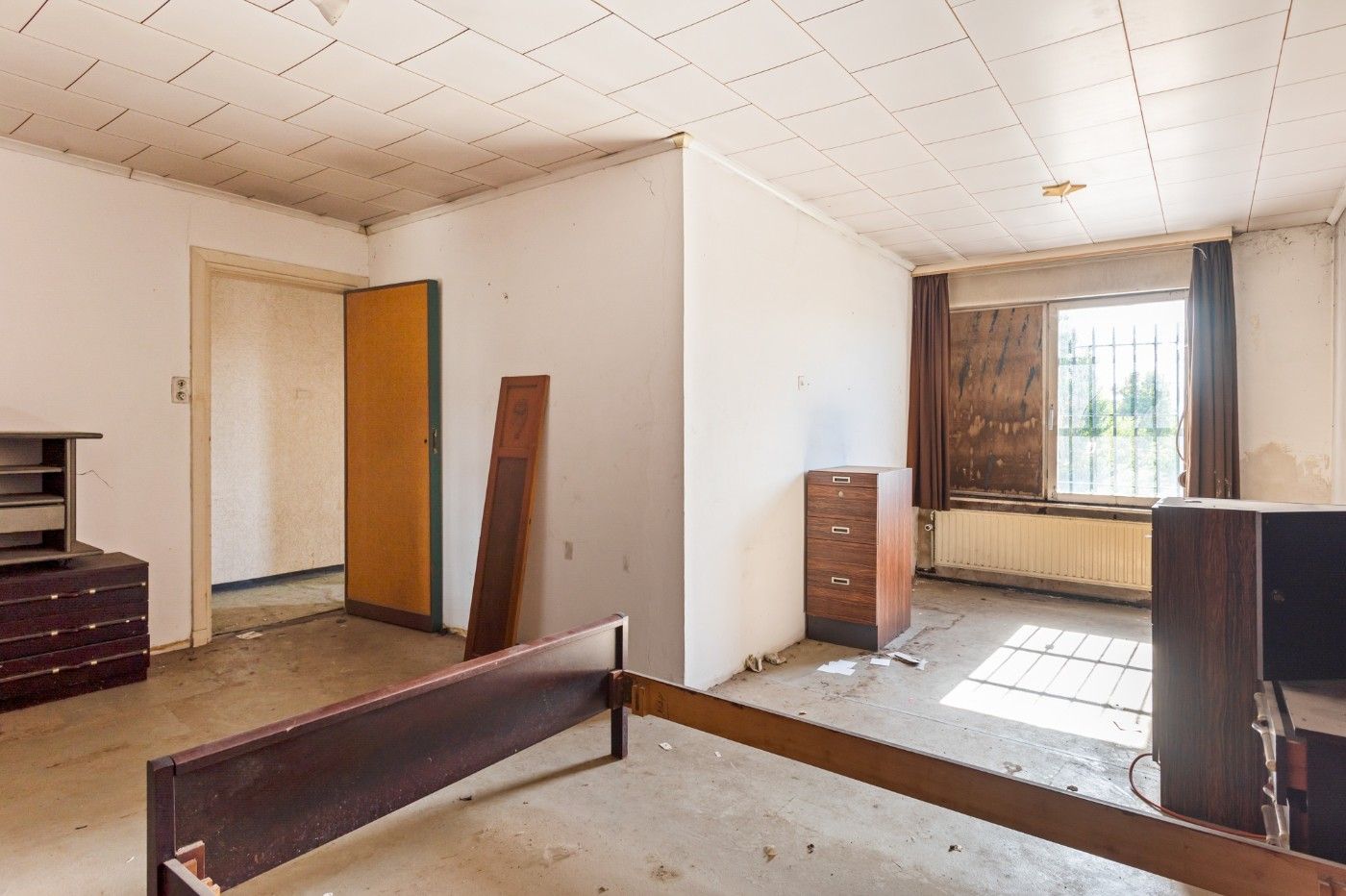 Te renoveren woning met 2 slpk., garage en grote tuin foto 11