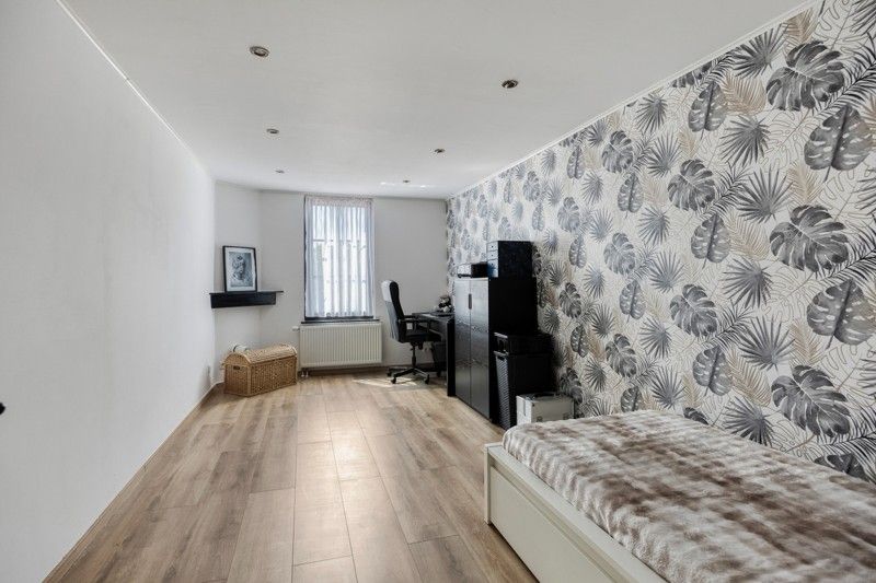 Volledig gerenoveerde woning foto 18