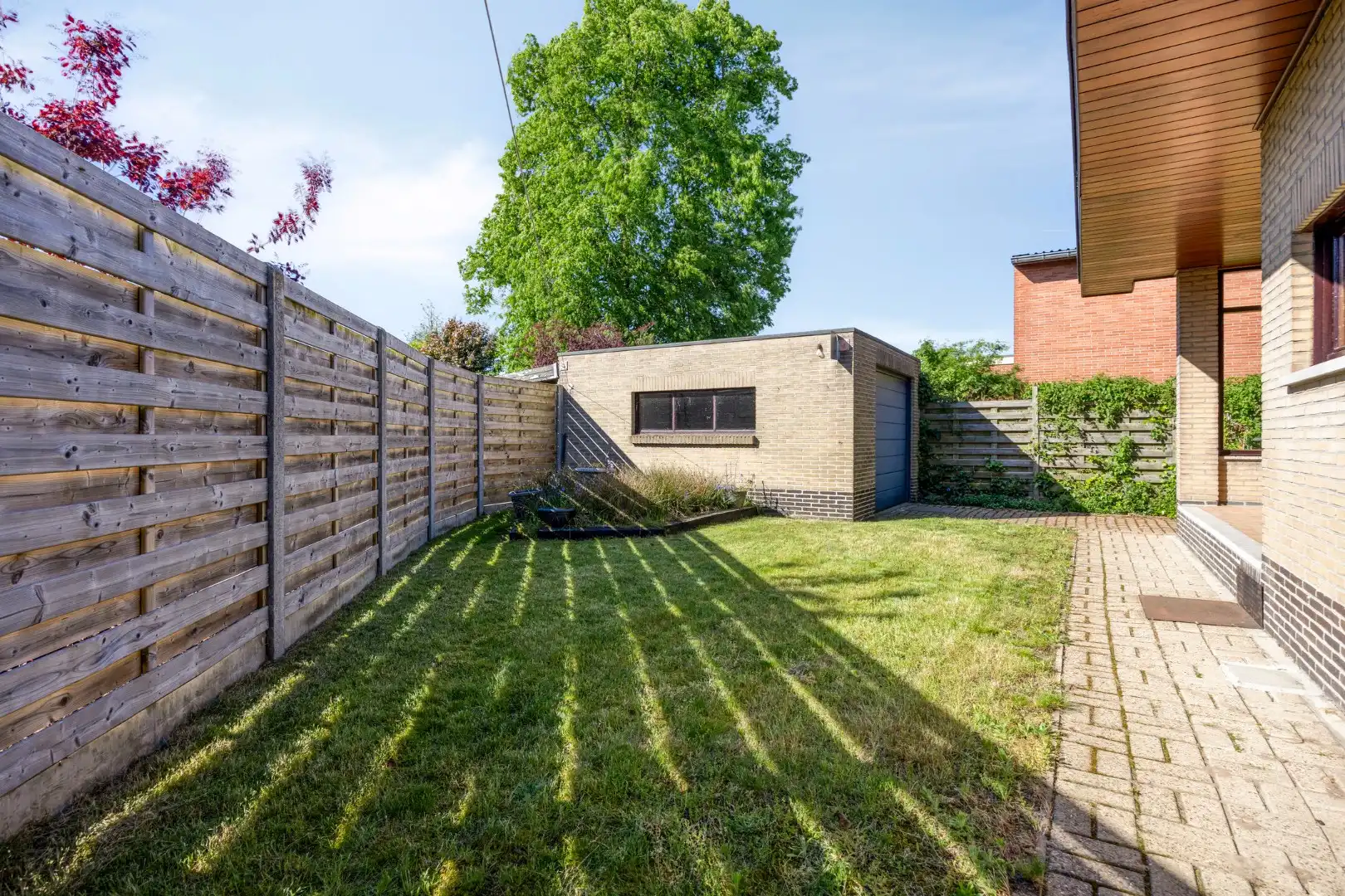 Rustig gelegen op te frissen gelijkvloers woning. foto 20