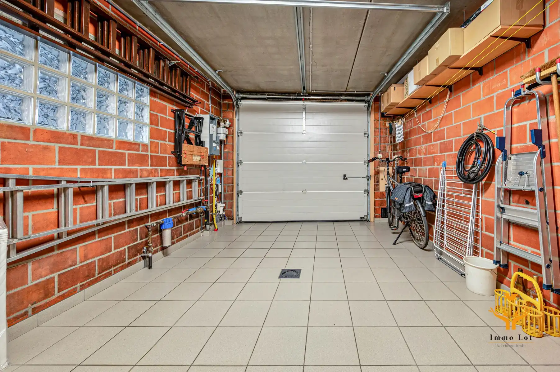 Instapklaar gelijkvloers appartement met tuin en garage foto 18