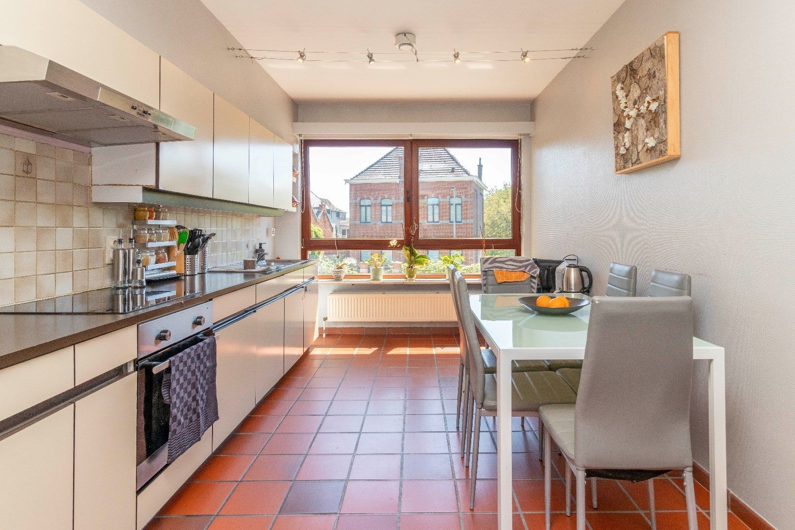 Ruim duplexappartement met gelijkvloerse handelsruimte foto 6