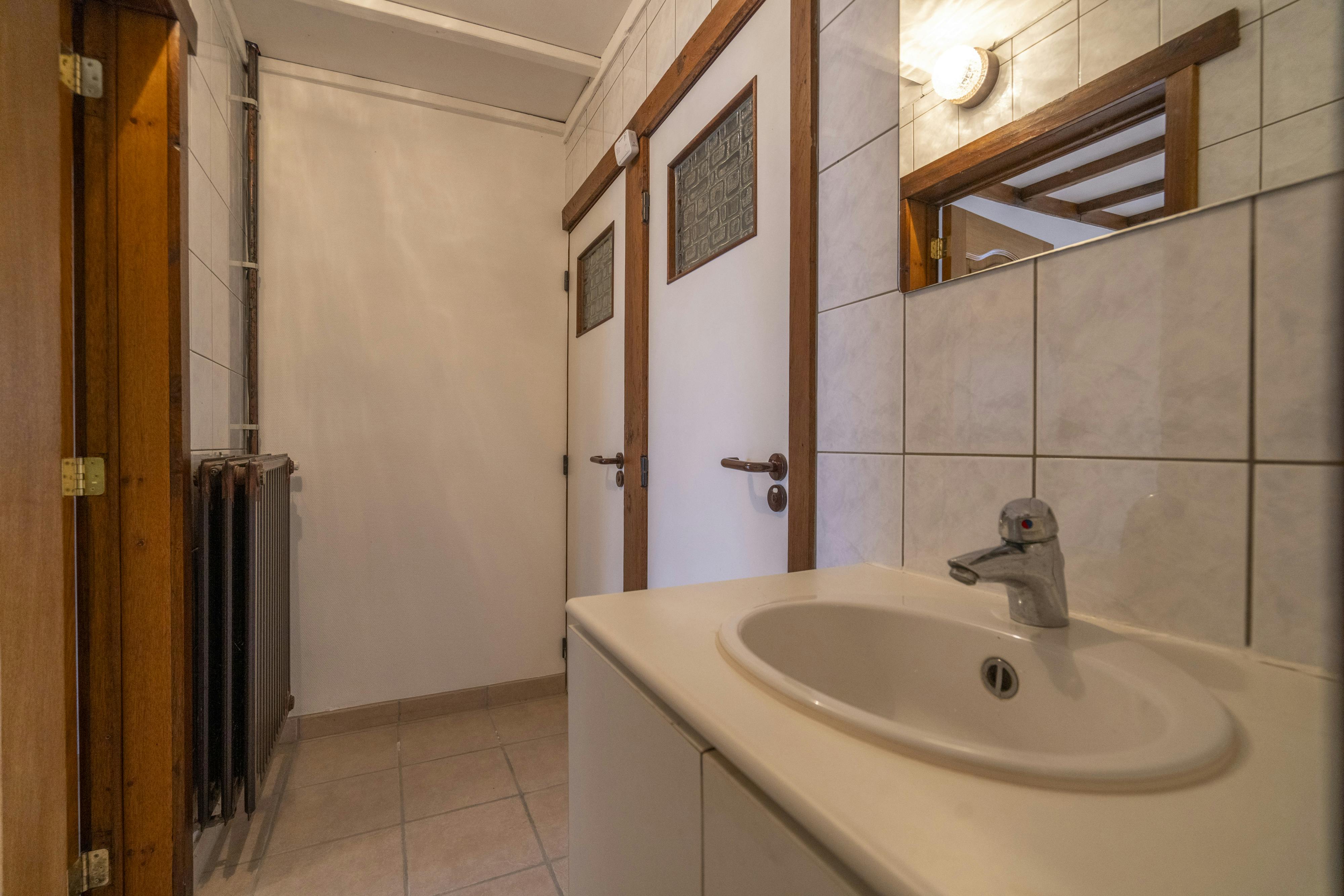 Commercieel interessant pand met woonst in Rekkem foto 9