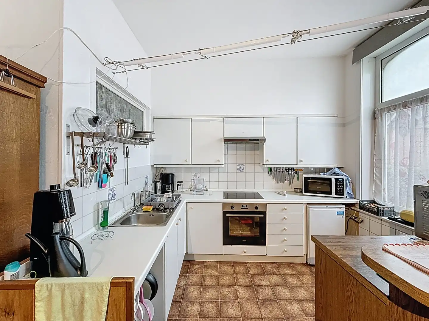 Investeringspand bestaande uit drie appartementen en handelspand in centrum Nieuwpoort foto 3
