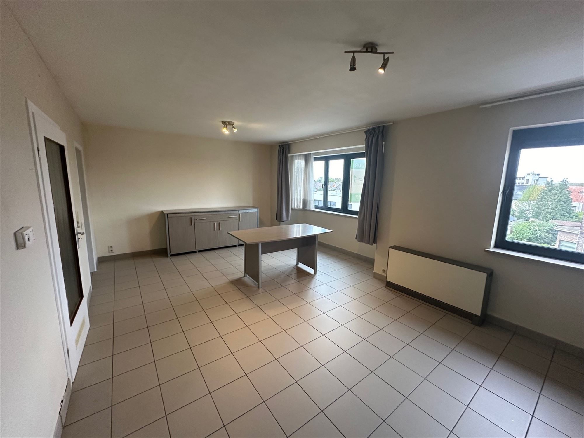 Tof appartement met 1 slaapkamer en terrasje! foto 3