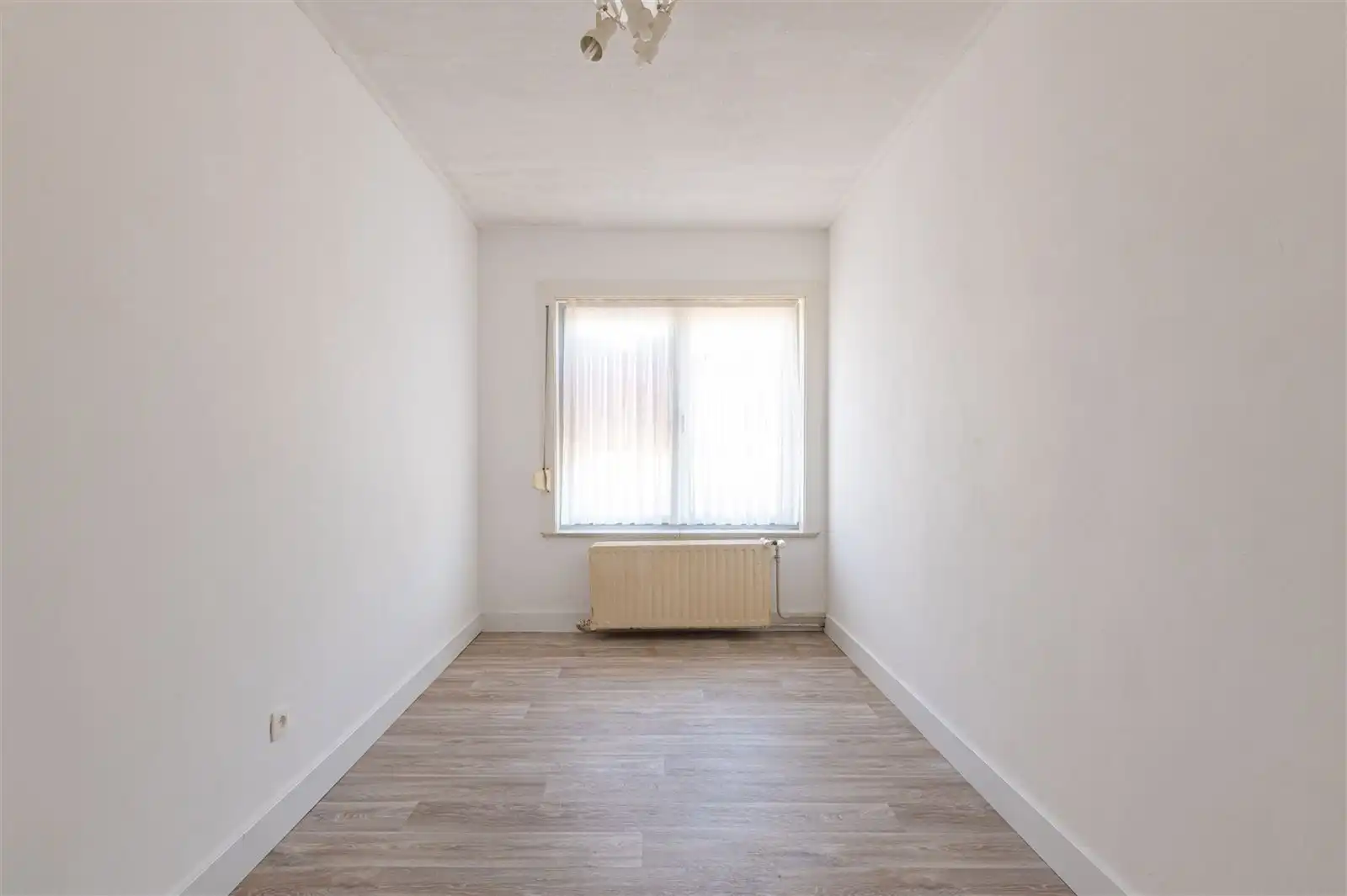 Halfopen bungalow met zonnige ruime tuin foto 10