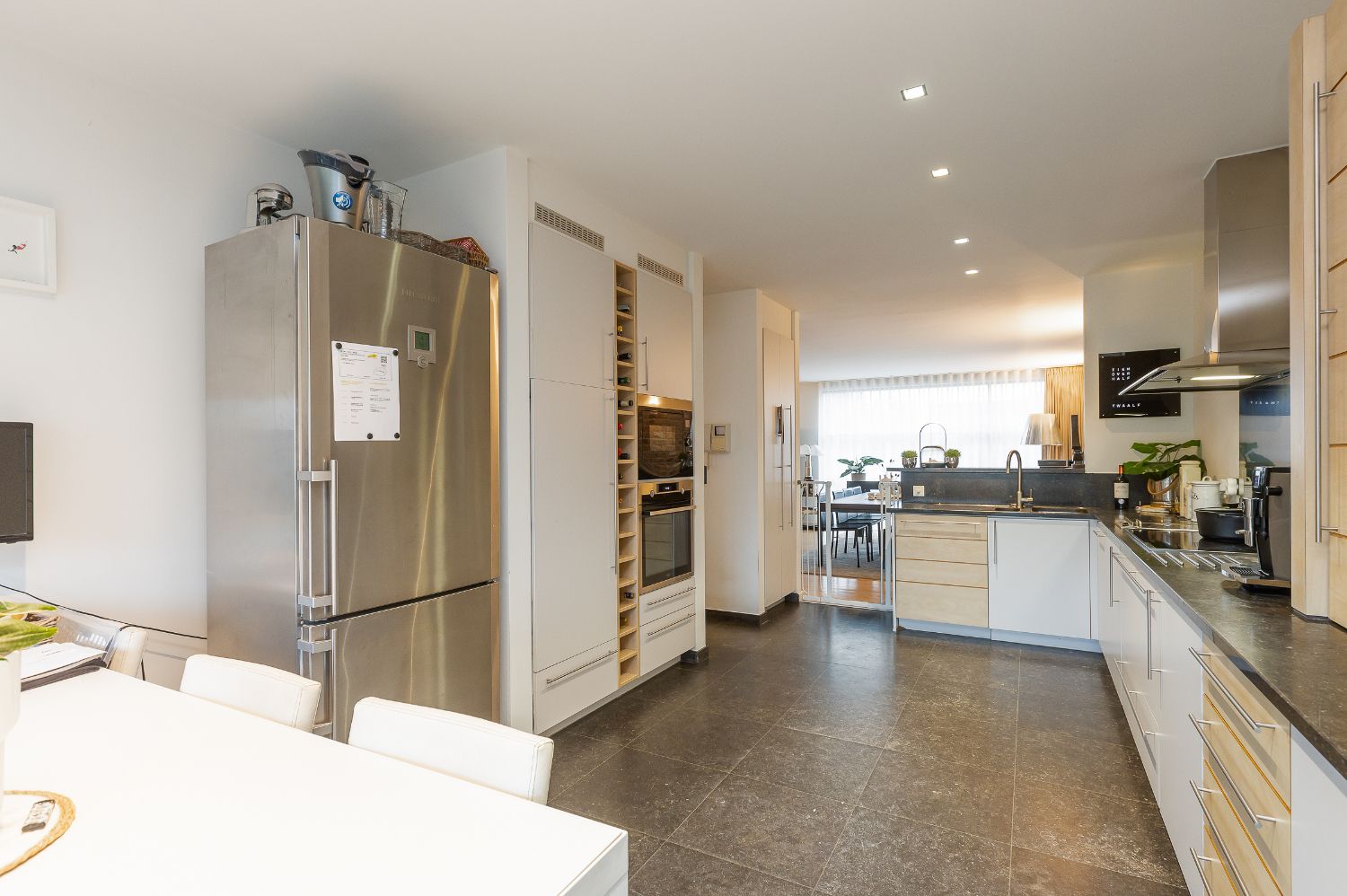 Moderne woning met handelsruimte op commerciële ligging! foto 13