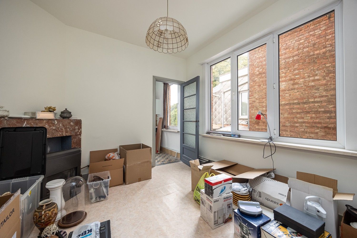 Te renoveren opbrengsteigendom met 3 éénslaapkamerappartementen nabij het Boekenbergpark foto 12