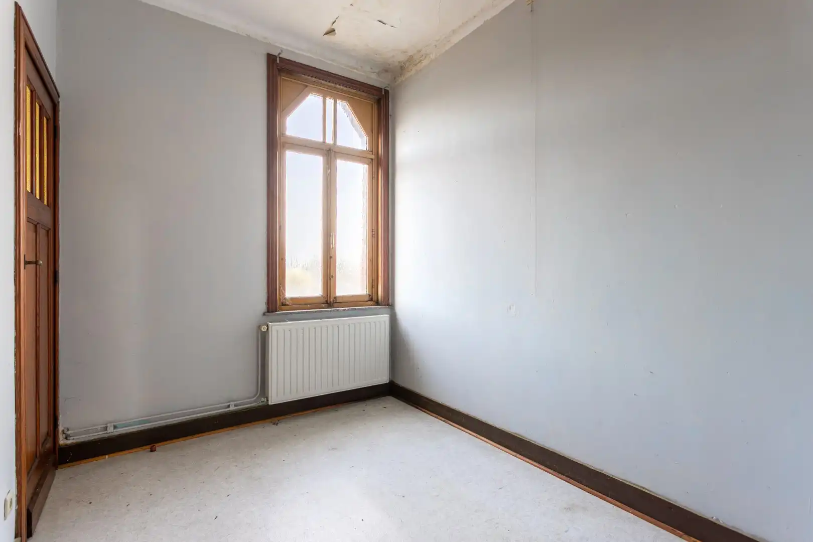 Kraktervolle woning met veel potentieel, 2 autostaanplaatsen en tuin te Dworp foto 24