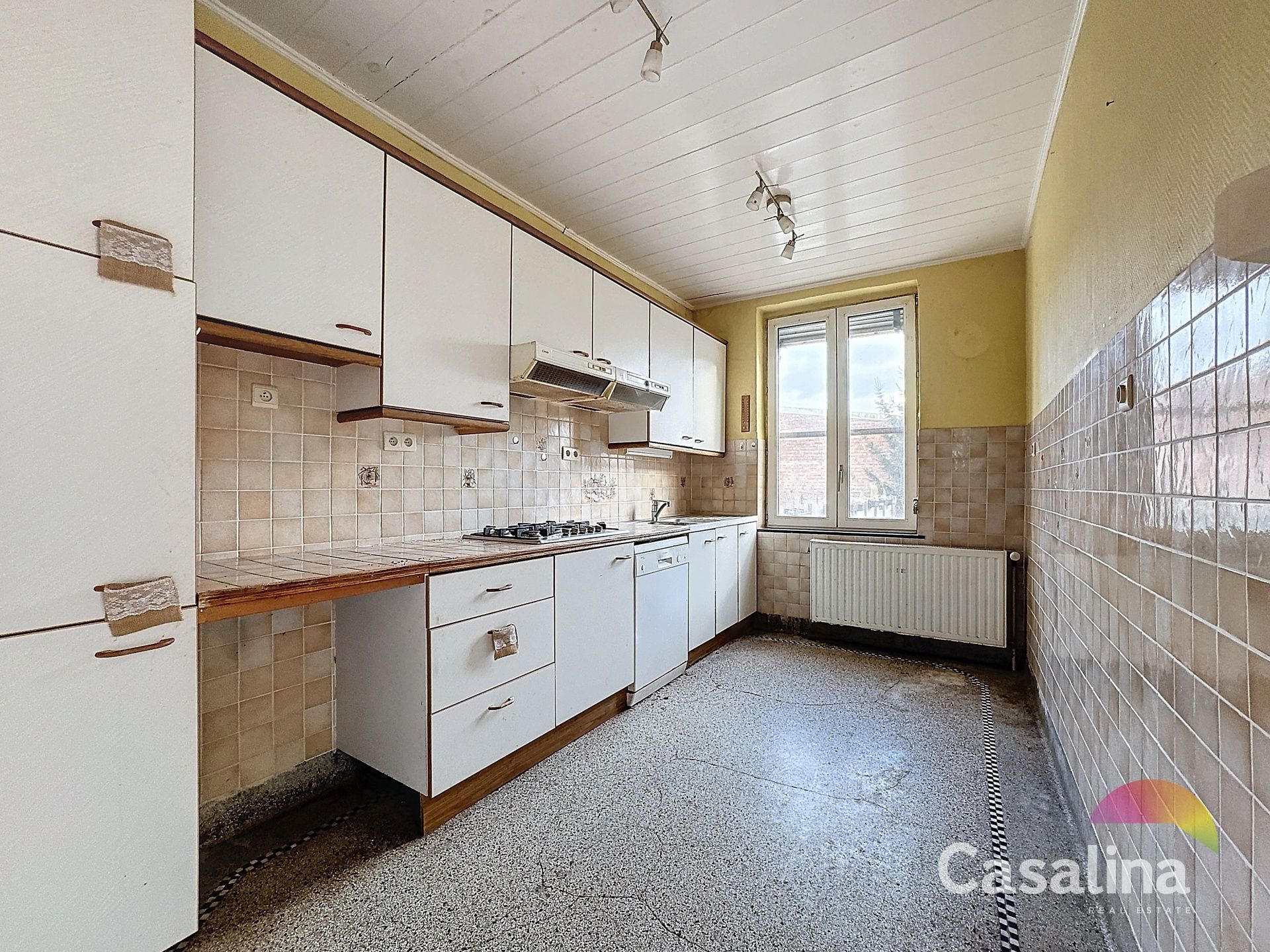 ONDER OPTIE - Huis te renoveren met een tuin van 250m² foto 8