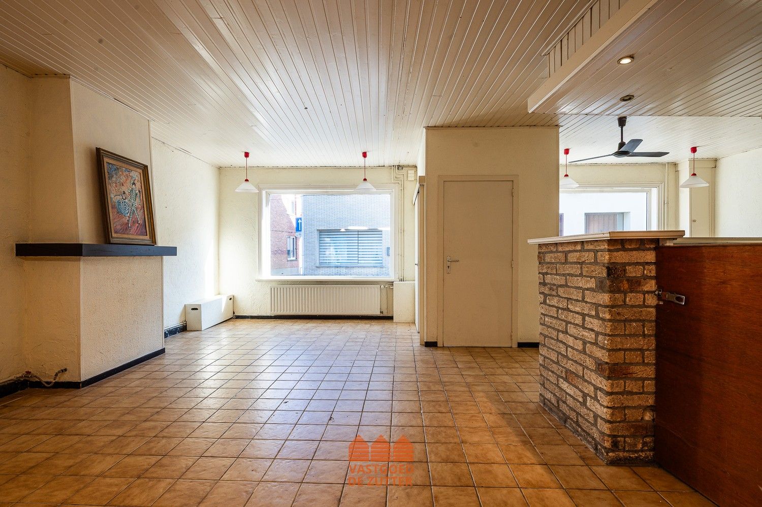 Ruime woning met handelspand in het centrum van Boekhoute foto 24