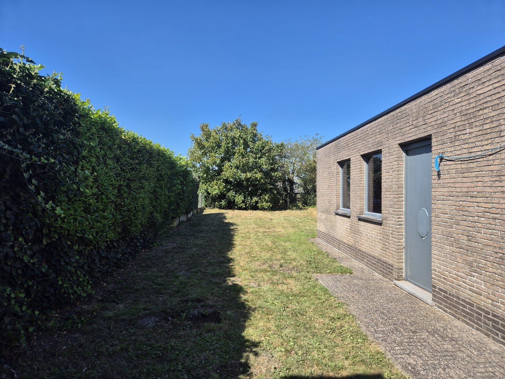 Mooi gelegen halfopenbebouwing met tuin en garage. foto 13
