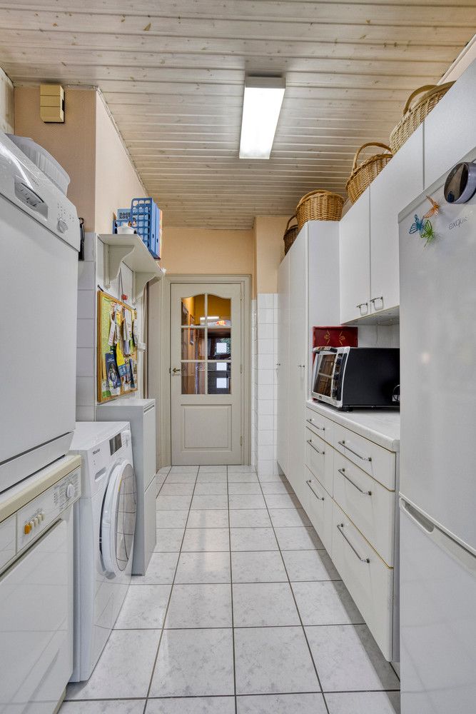 Vlakbij Boekenberg Park gelegen bel-étagewoning met 3 slks, tuin en garage. foto 22