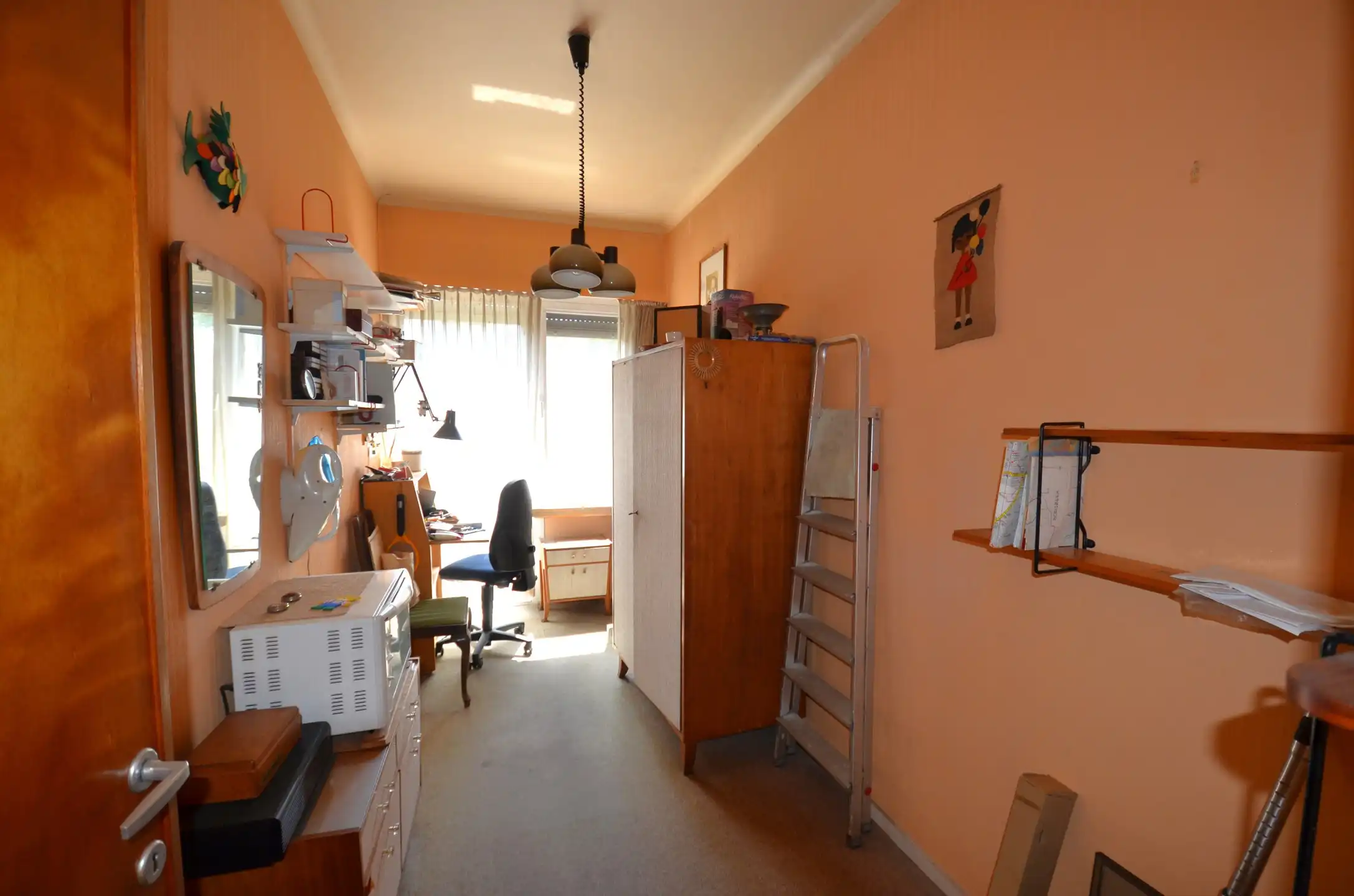 Te renoveren woning met 2 slaapkamers, garage en zonnige zuid-tuin foto 11