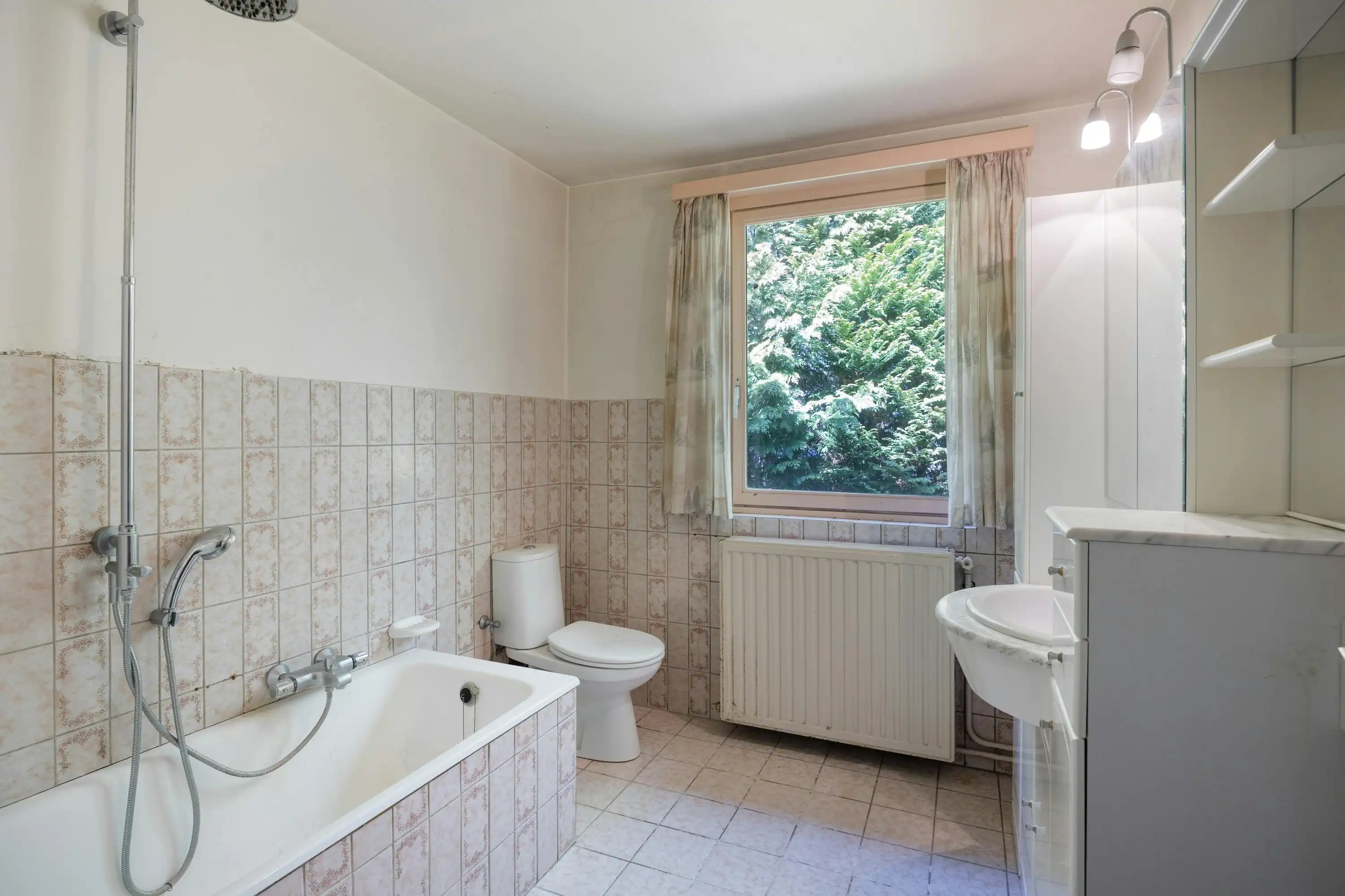 Te renoveren woning met grote tuin in Heide-Kalmthout! foto 16
