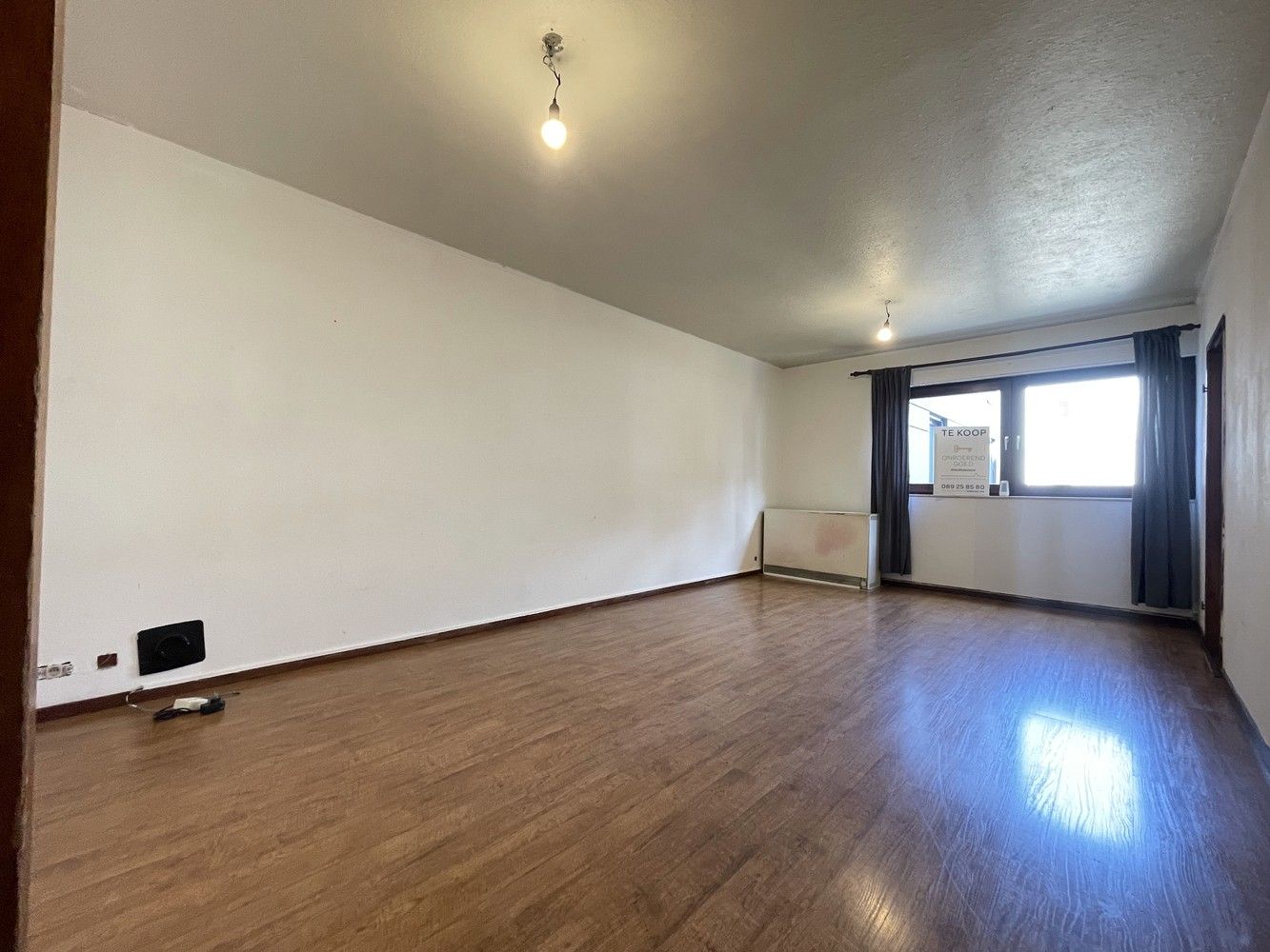 Centraal gelegen appartement met 2 slaapkamers en autostaanplaats foto {{pictureIndex}}