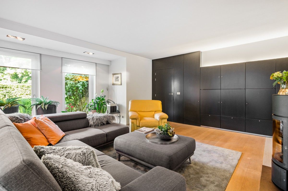 Verrassend ruime woning op 1289 m² gelegen aan een bosrand met mogelijkheid tot 4 slaapkamers foto 4