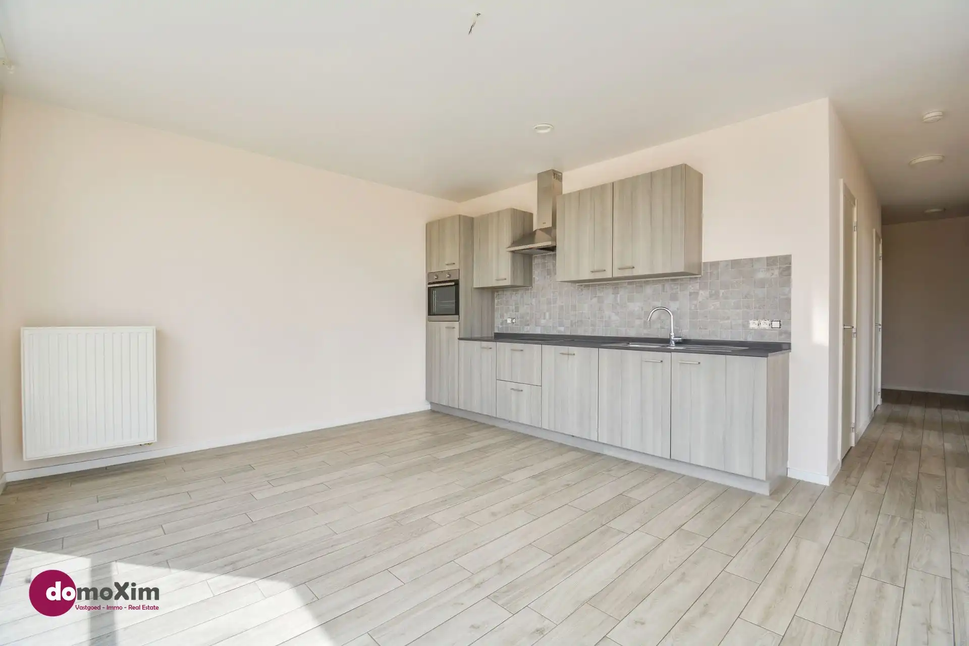 Lichtrijk appartement met 2 slaapkamers en groot terras in hartje Boortmeerbeek foto 3