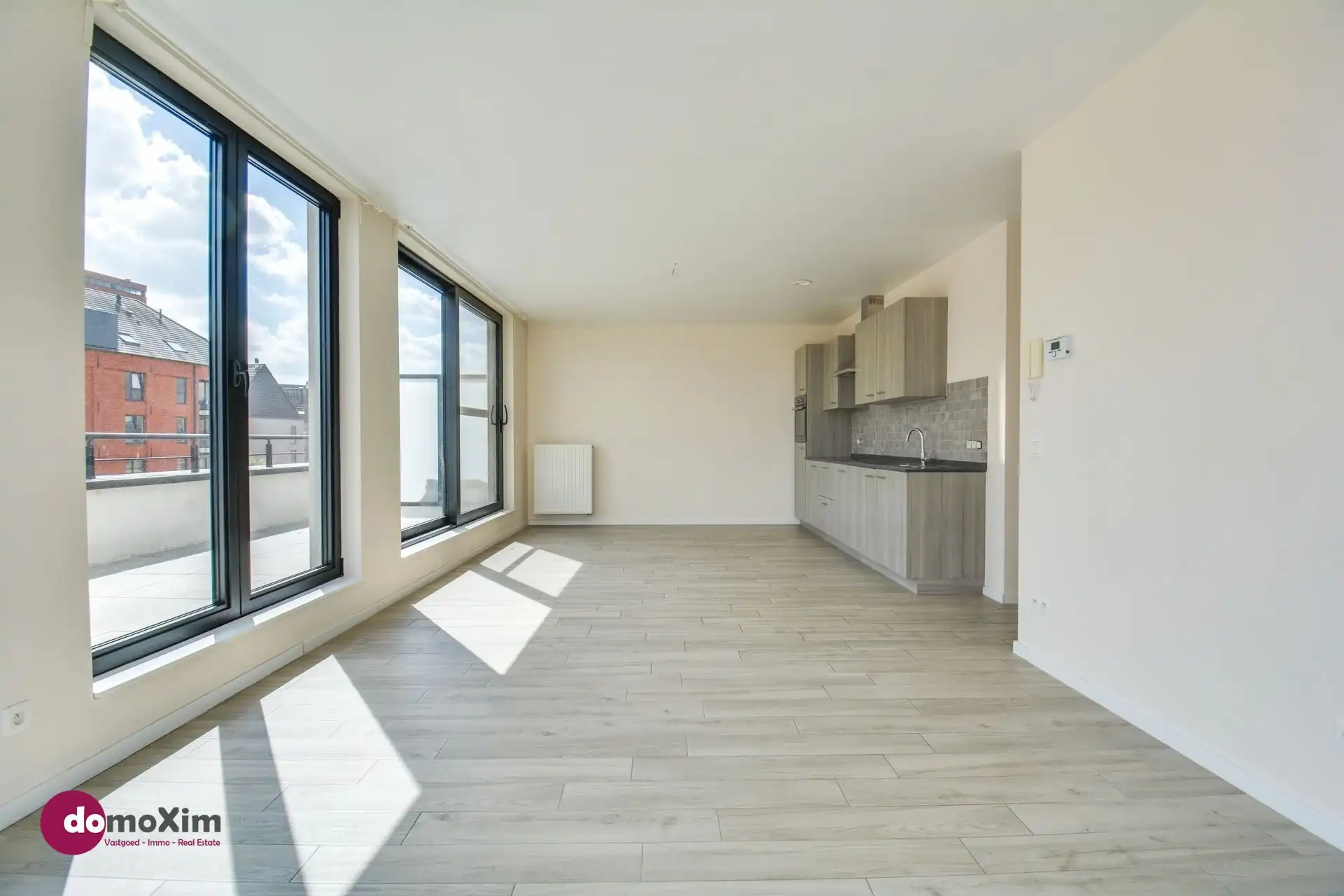Lichtrijk appartement met 2 slaapkamers en groot terras in hartje Boortmeerbeek foto 3