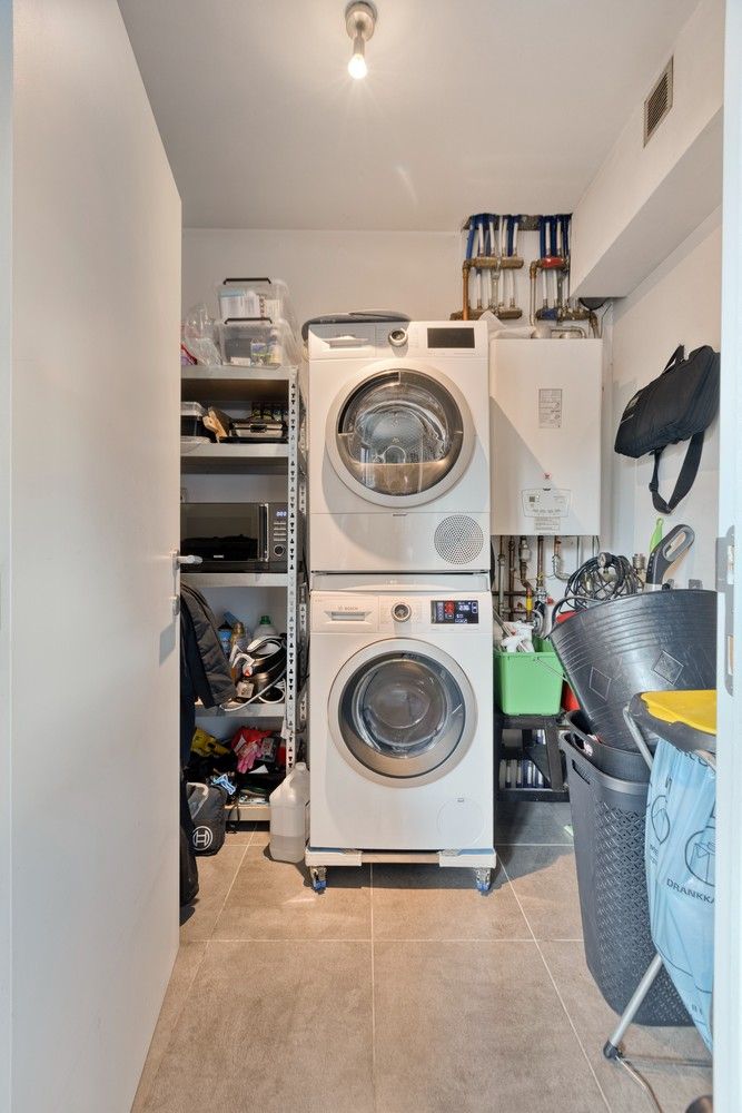 Instapklare en lichtrijke duplex met terras, garage én drie slaapkamers foto 15