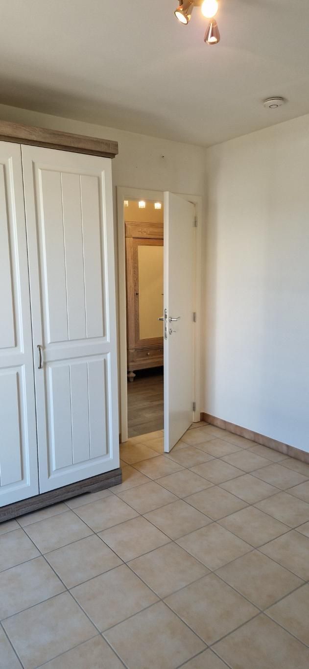 Zonnig APPARTEMENT, hob., 2de.verd., met mooie leefruimten, 2 slpkmrs, aparte kelder en ondergrondse autostaanplaats,  foto 11