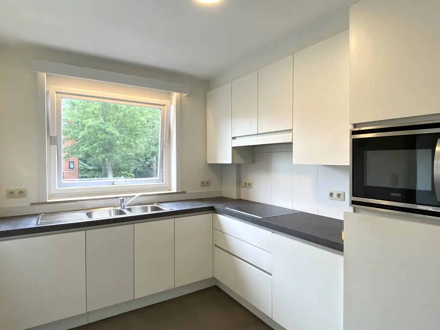 APPARTEMENT MET 2 SLAAPKAMERS | TERRAS EN GARAGE !!! foto 3