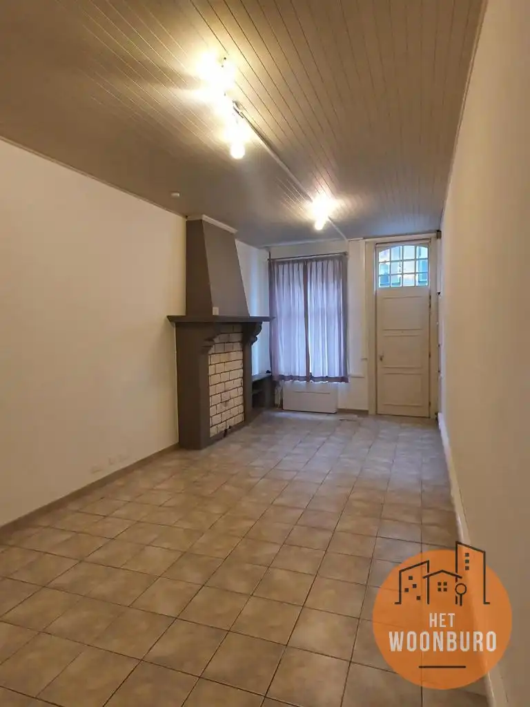 Gerenoveerde rijwoning met terras en tuintje foto 3