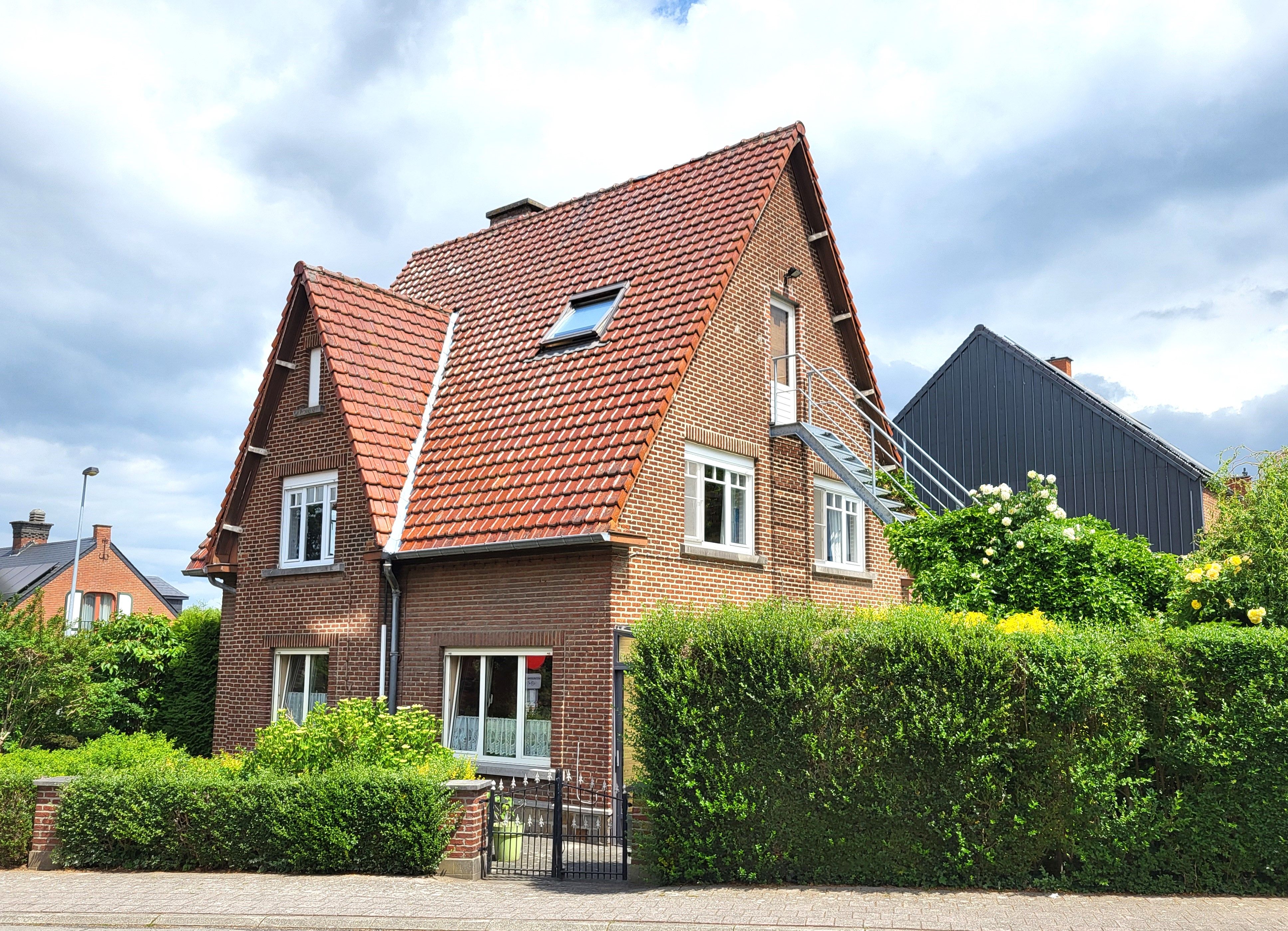 Charmante open bebouwing op 488m² met mooie aangelegde tuin.  foto 4