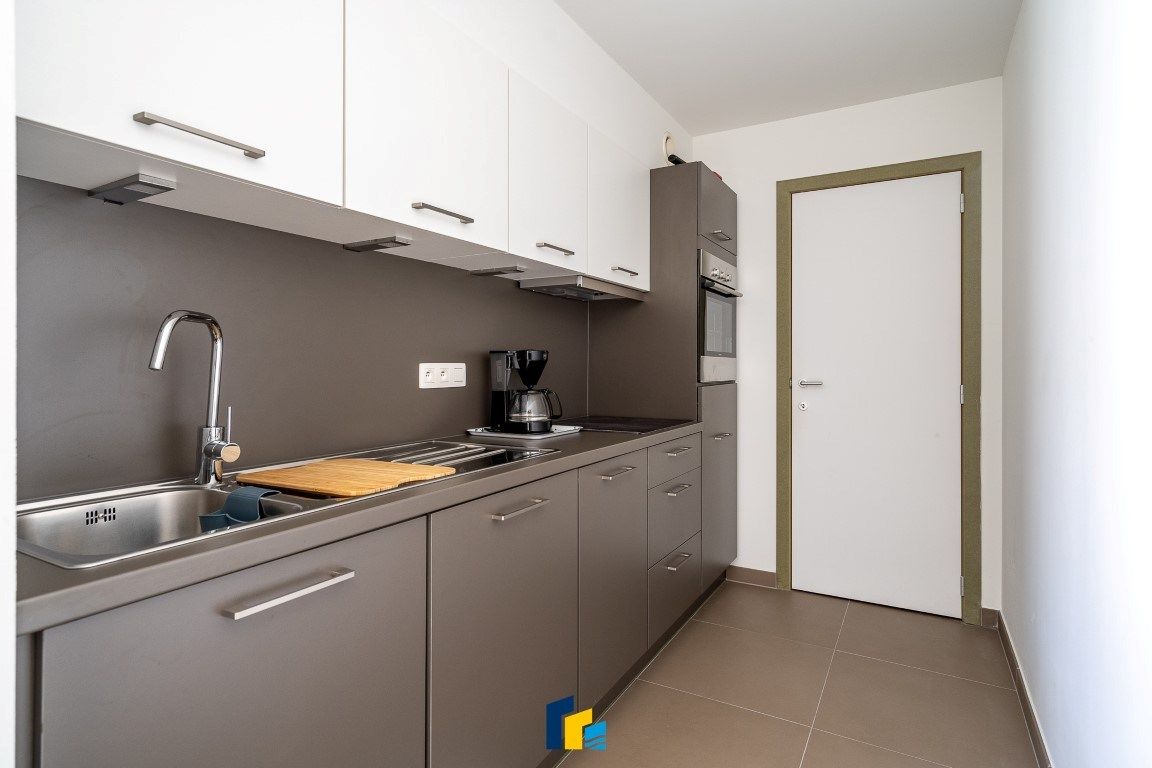 Stijlvolle studio met balkon in rustige setting foto 7