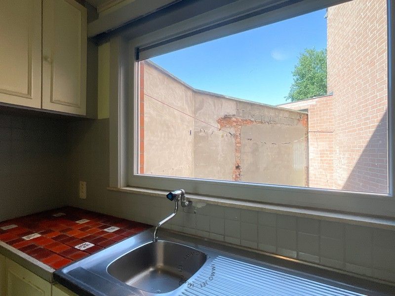 Woning met 2 slaapkamers en koer in het centrum van Sint-Gillis-Waas foto 6