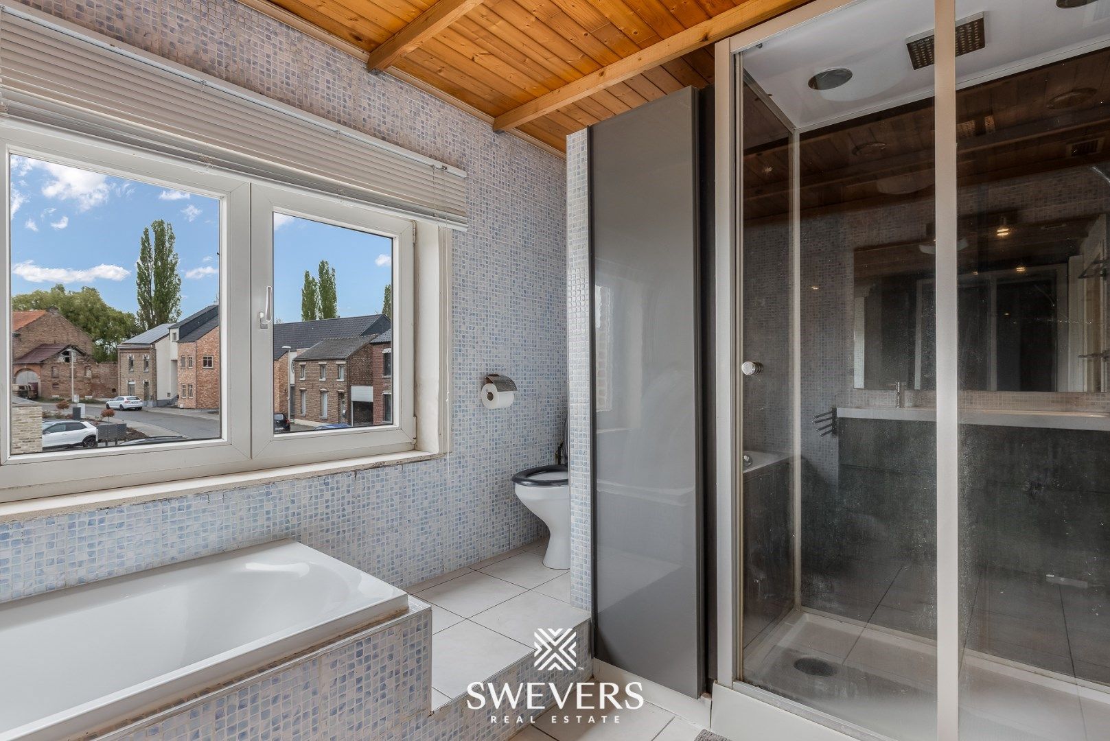 Gezellige woning met veranda, garage & zonnige tuin foto 13