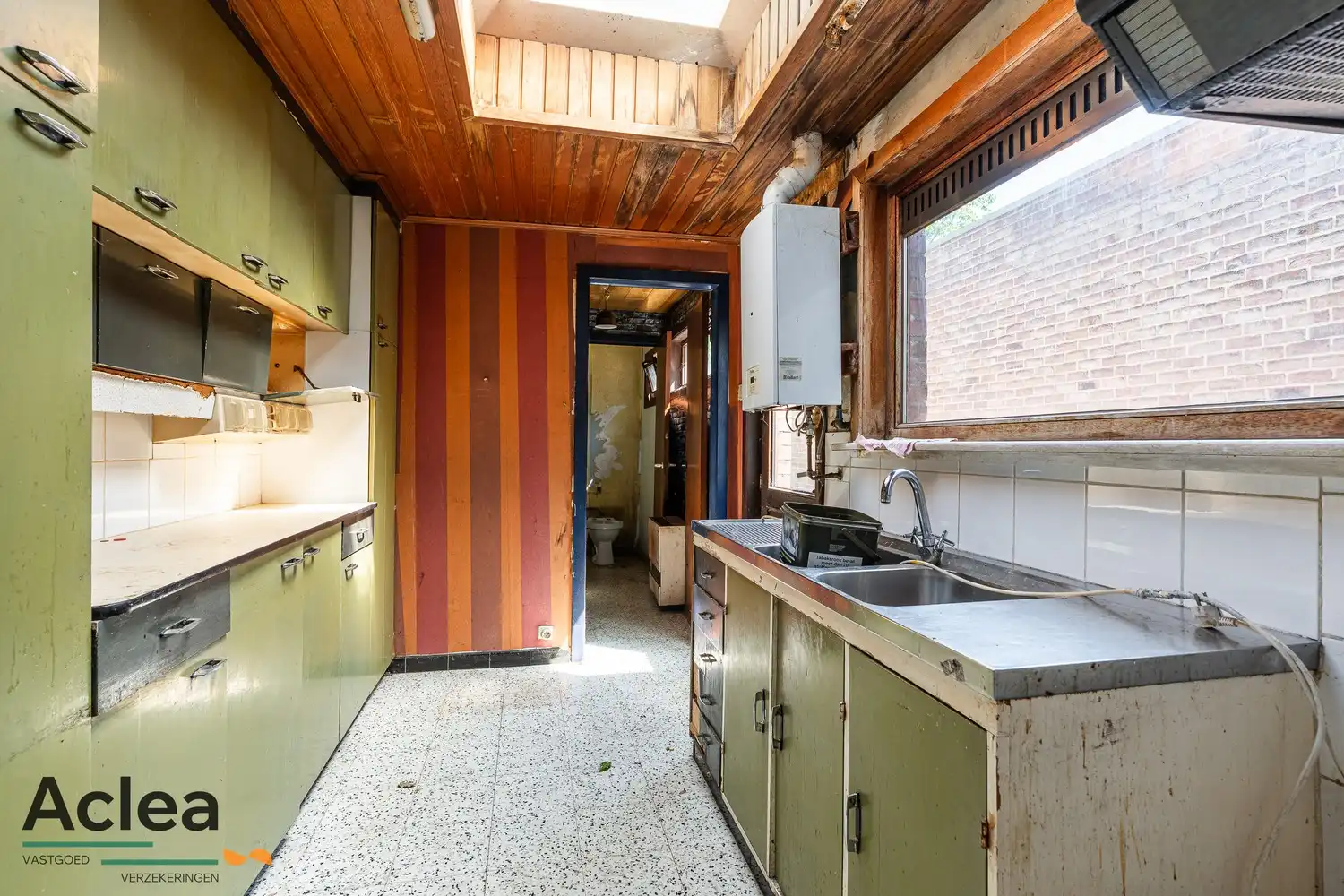 Te renoveren stadswoning met 4 slaapkamers en gezellige tuin foto 7