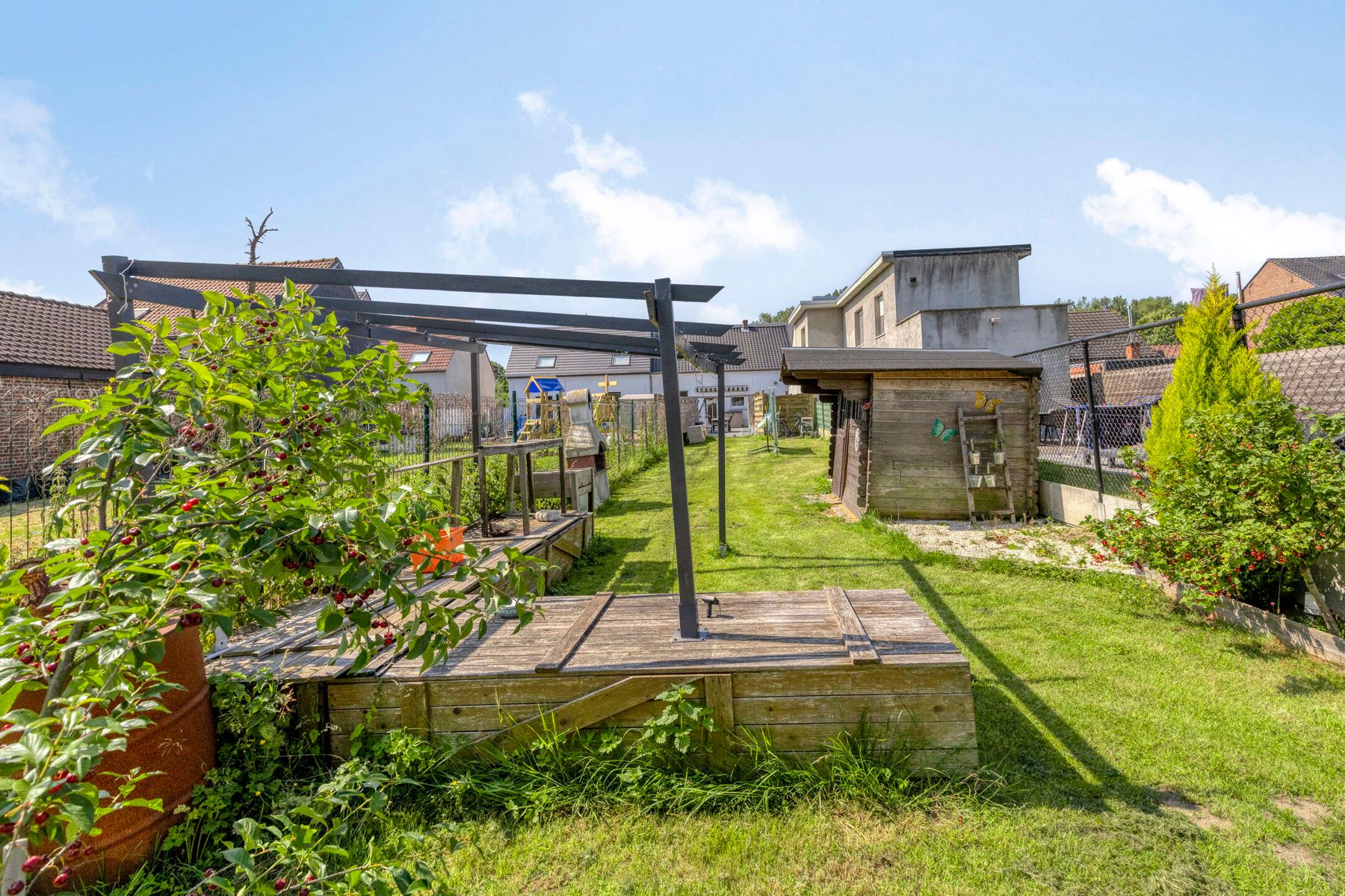 Half-open bebouwing met 3 slaapkamers en tuin! foto 18
