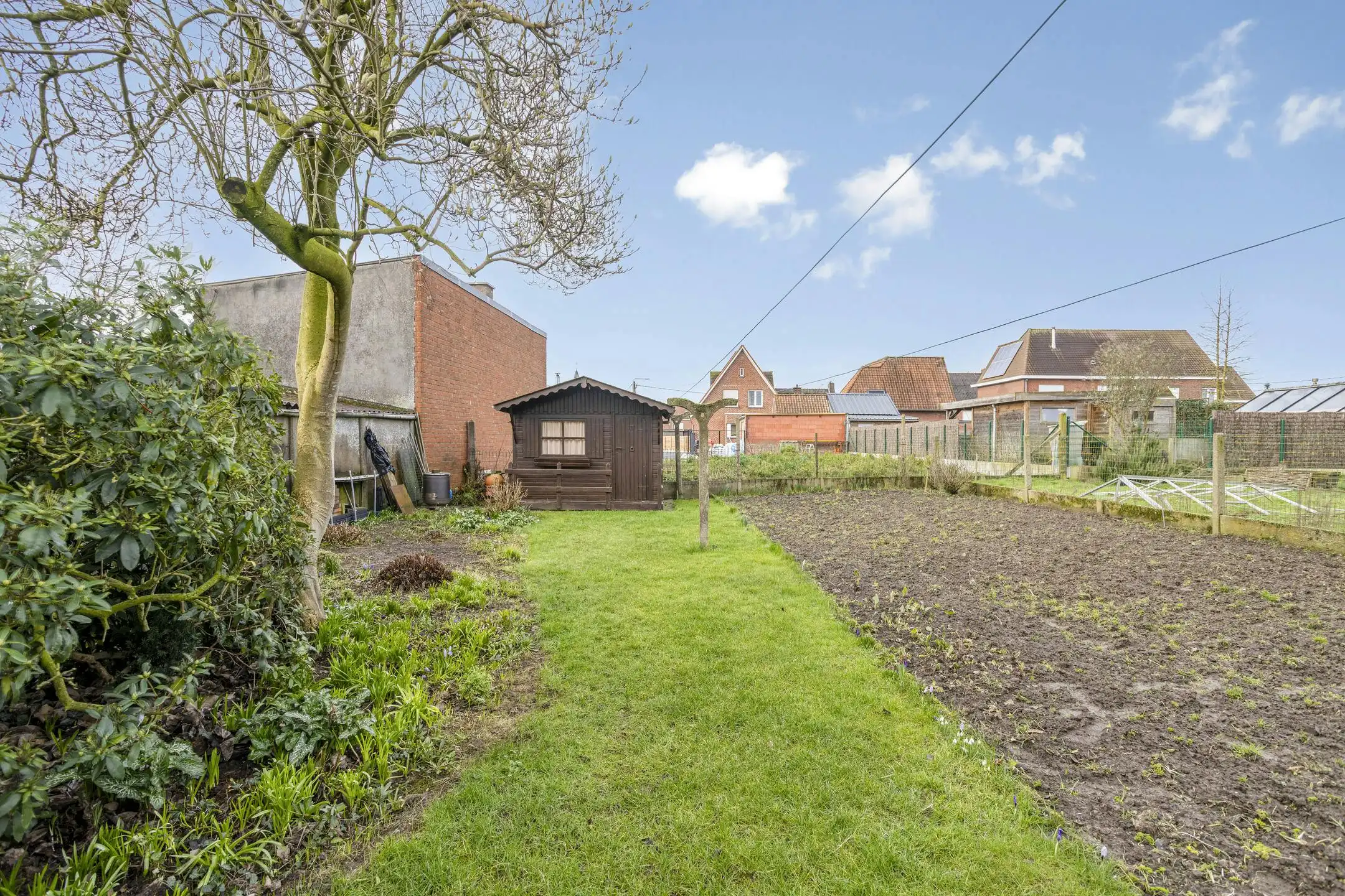 Te renoveren statige woning met royale tuin in Ardooie foto 23