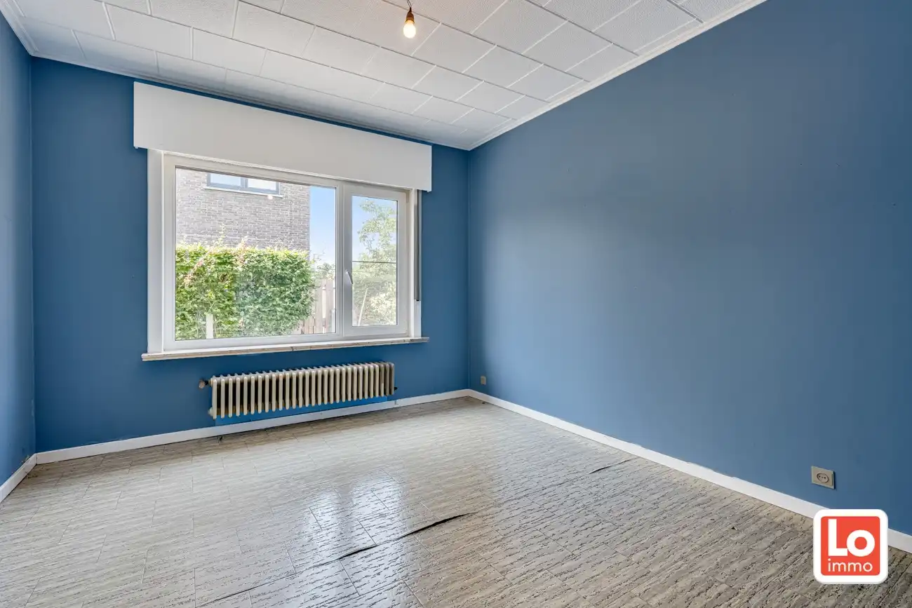 Volledig te renoveren open woning met ruime afzonderlijke garage en tuin op een toplocatie nabij Oude Bareel in Sint-Amandsberg/Oostakker! foto 14