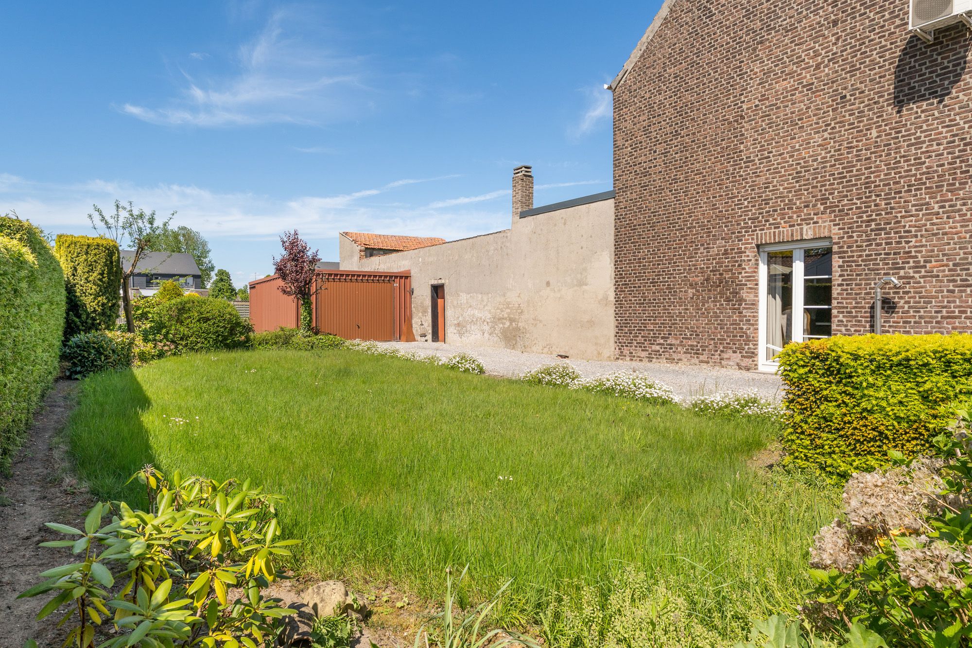 Te renoveren woning met bouwgrond te koop in de Kanaallaan 55 te Bree voor 262.000 euro! foto 24