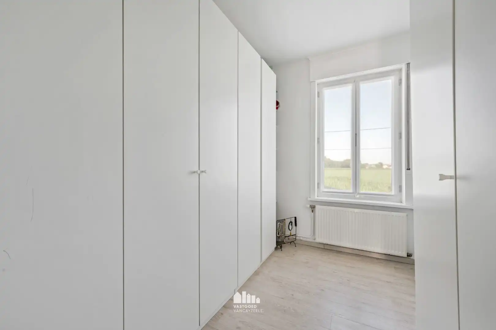 Instapklare halfopen woning met 5 slaapkamers, dubbele garage en zonnige tuin in Komen-Waasten. foto 21